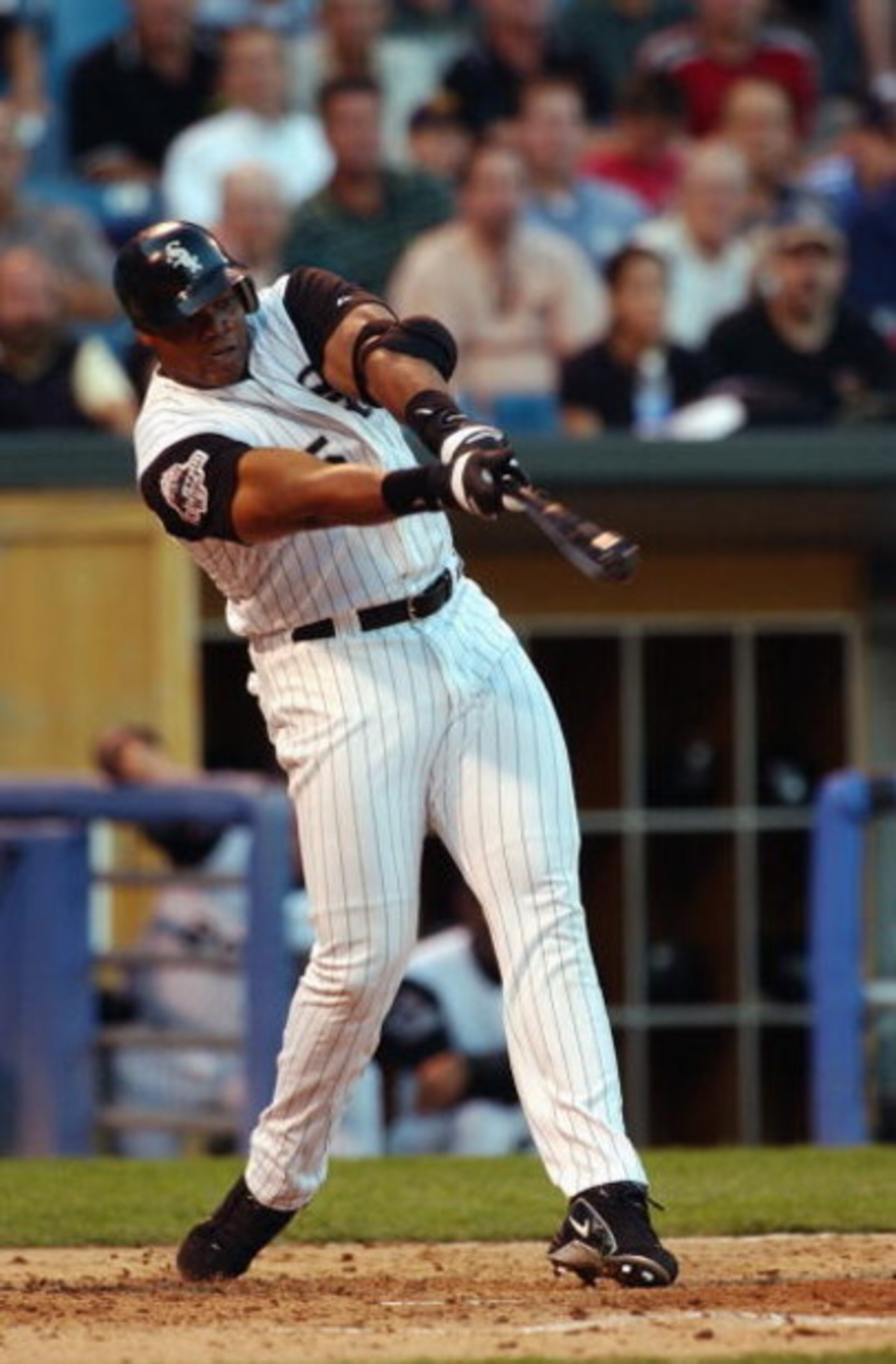 CHICAGO - SEPTEMBER 3:  Designated hitter Frank Thomas #35 of the Chicago White Sox swings at a pitch against the Boston Red Sox during a game on September 3, 2003 at U.S. Cellular Field in Chicago, Illinois. The Red Sox defeated the White Sox 5-4 in 10 i