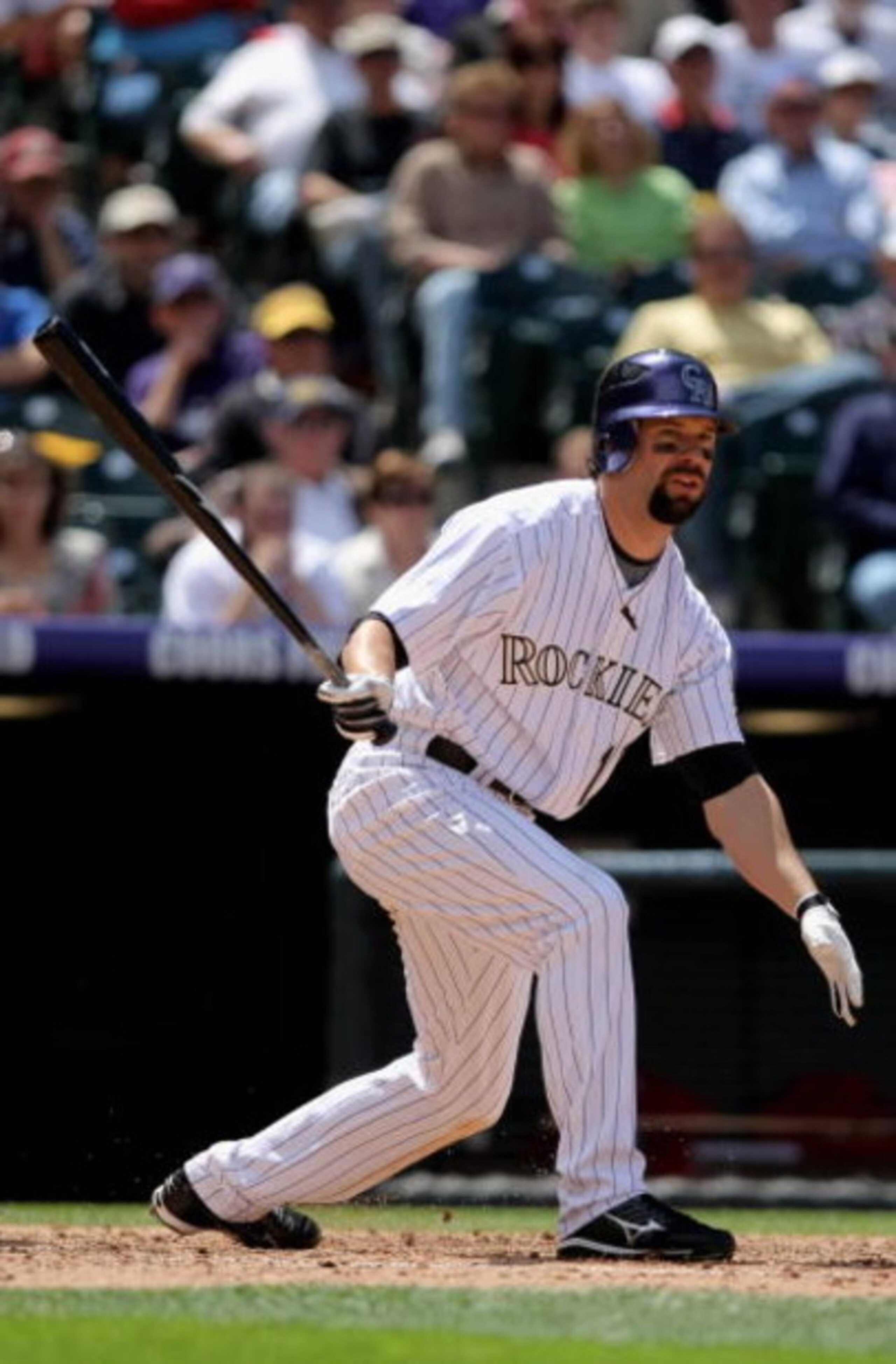 DENVER - MAY 08:  First baseman Todd Helton #17 of the Colorado Rockies takes an at bat against the St. Louis Cardinals at Coors Field on May 8, 2008 in Denver, Colorado. The Rockies defeated the Cardinals 9-3.  (Photo by Doug Pensinger/Getty Images)