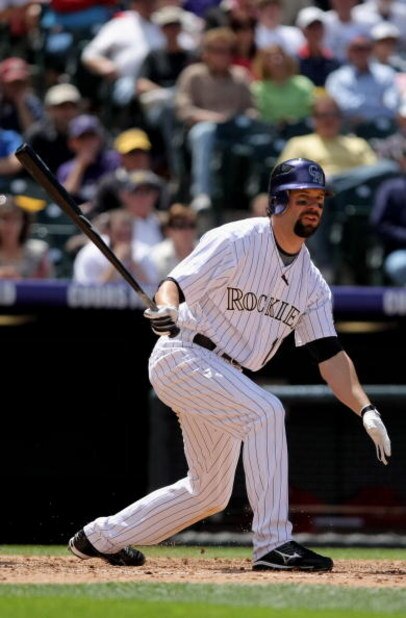 DENVER - MAY 08:  First baseman Todd Helton #17 of the Colorado Rockies takes an at bat against the St. Louis Cardinals at Coors Field on May 8, 2008 in Denver, Colorado. The Rockies defeated the Cardinals 9-3.  (Photo by Doug Pensinger/Getty Images)