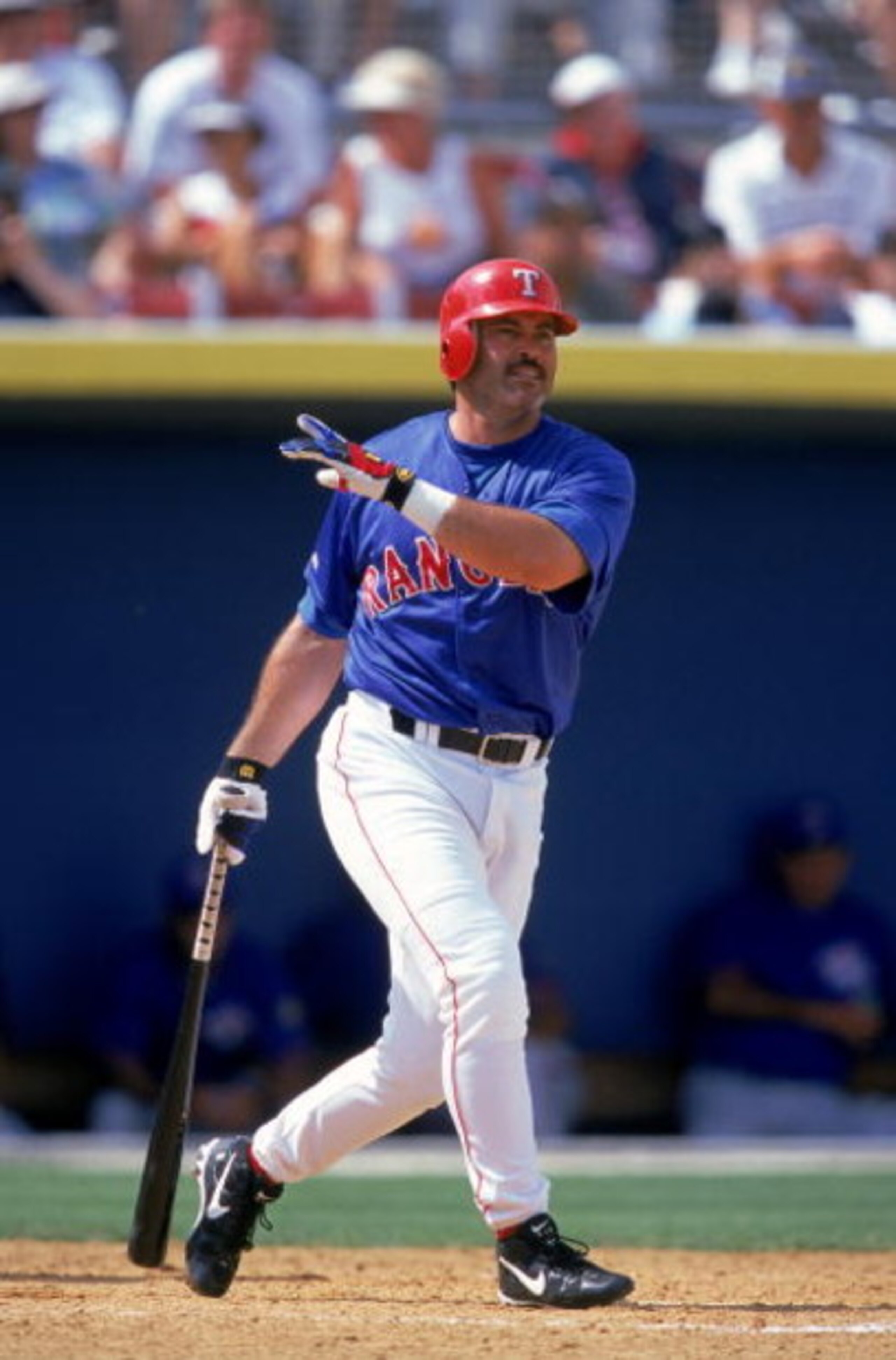 10 Mar 2000: Rafael Palmeiro #25 of the Texas Rangers swings at the ball during the Spring Training Game against the Toronto Blue Jays  at the Charlotte County Stadium in Port Charlotte, Florida. Mandatory Credit: Andy Lyons  /Allsport