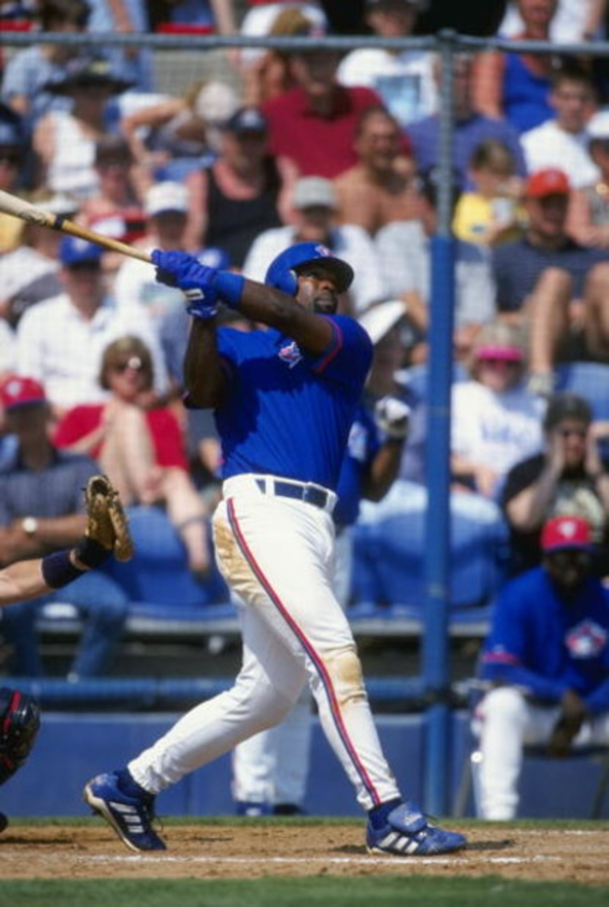 21 Mar 1999: Infielder Carlos Delgado #25 of the Toronto Blue Jays swings at the ball during the Spring Training game against the  Boston Red Sox at the Dunedin Stadium in Dunedin, Florida. The Red Sox defeated the Blue Jays 4-3. Mandatory Credit: Harry H