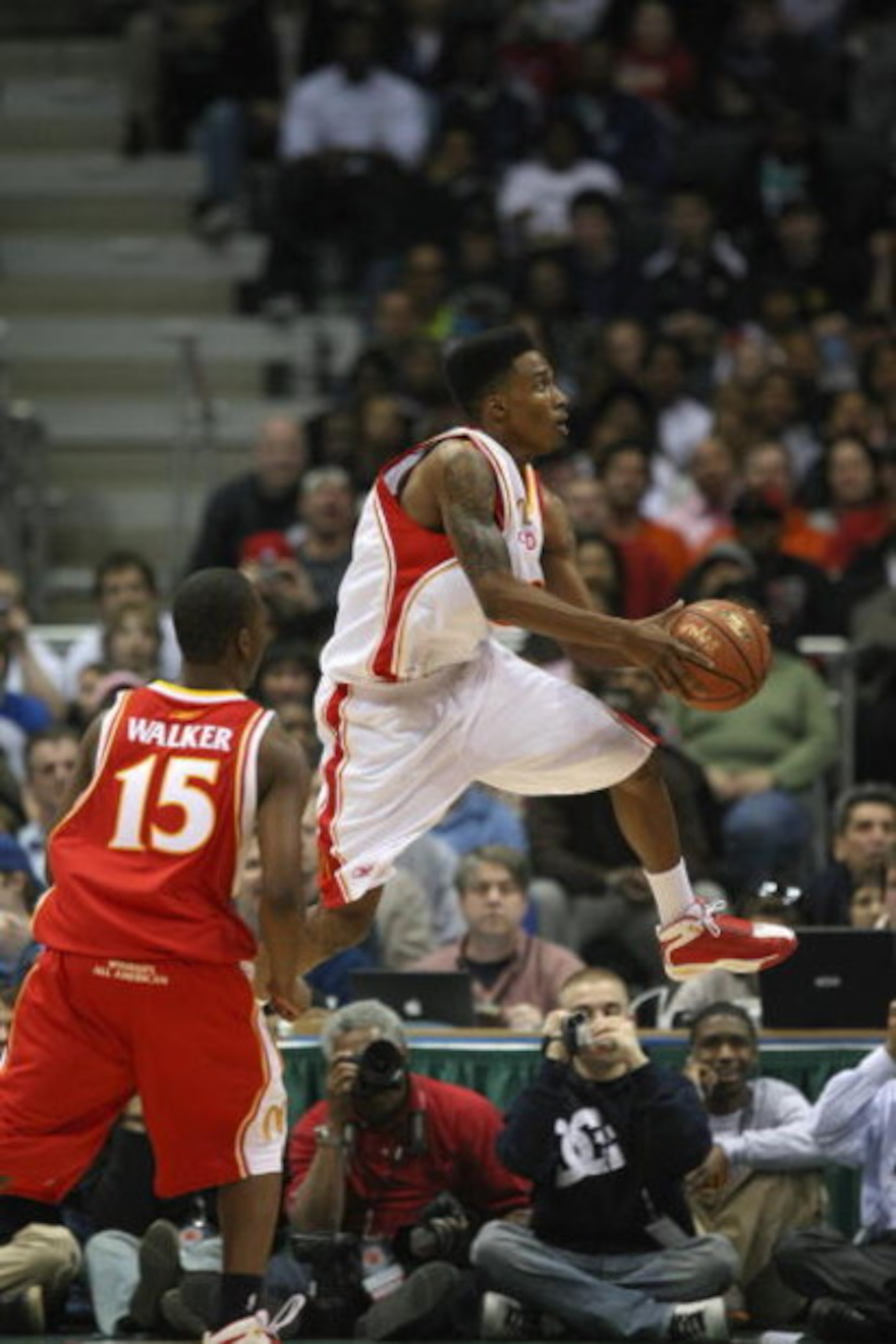 MILWAUKEE - MARCH 26: Brandon Jennings #3 of the West team goes up with the ball over Kemba Walker #15 of the East team during the 2008 McDonald's All American High School Boys basketball game on March 26, 2008 at the Bradley Center in Milwaukee, Wiscons MILWAUKEE - MARCH 26: Brandon Jennings #3 of the West team goes up with the ball over Kemba Walker #15 of the East team during the 2008 McDonald's All American High School Boys basketball game on March 26, 2008 at the Bradley Center in Milwaukee, Wiscons