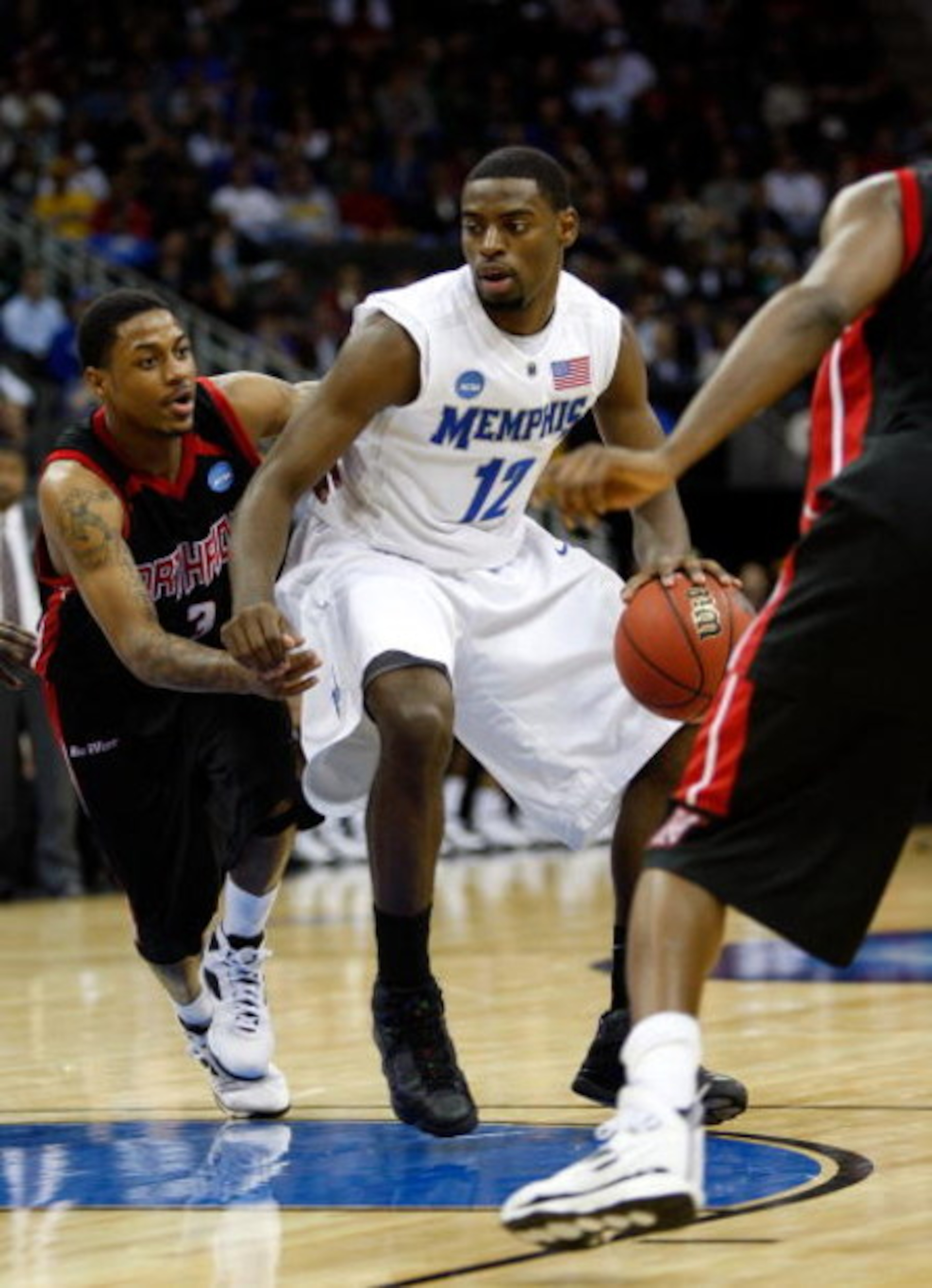 KANSAS CITY, MO - MARCH 19: Tyreke Evans #12 of the Memphis Tigers dribbles the ball against Mark Hill #3 of the CSUN Matadors during the first round of the NCAA Division I Men's Basketball Tournament at the Sprint Center on March 19, 2009 in Kansas City KANSAS CITY, MO - MARCH 19: Tyreke Evans #12 of the Memphis Tigers dribbles the ball against Mark Hill #3 of the CSUN Matadors during the first round of the NCAA Division I Men's Basketball Tournament at the Sprint Center on March 19, 2009 in Kansas City