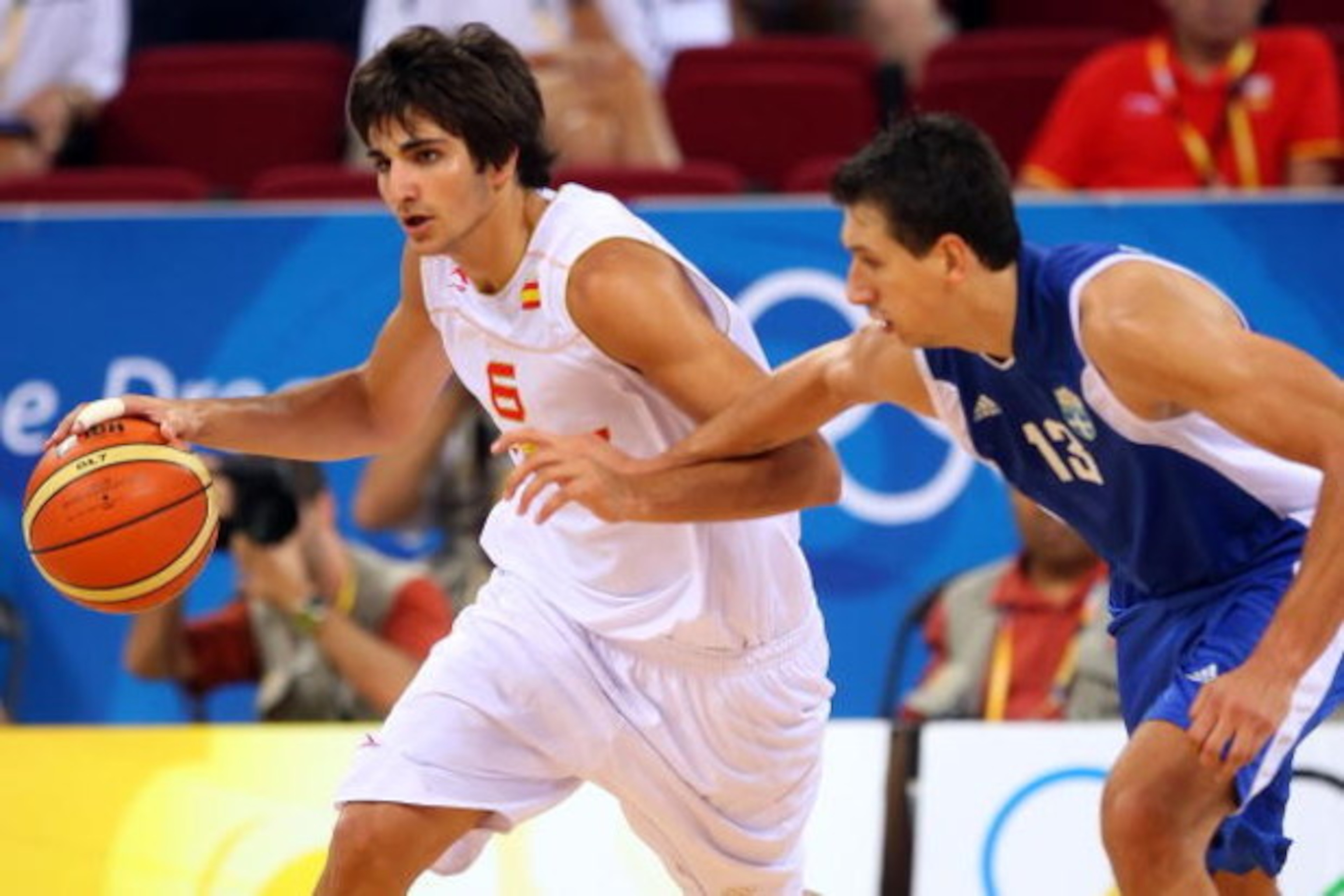 BEIJING - AUGUST 10: Ricky Rubio #6 of Spain drives on Dimitrios Diamantidis #13 of Greece during the day 2 preliminary game at the Beijing 2008 Olympic Games in the Beijing Olympic Basketball Gymnasium on August 10, 2008 in Beijing, China. (Photo by Ph BEIJING - AUGUST 10: Ricky Rubio #6 of Spain drives on Dimitrios Diamantidis #13 of Greece during the day 2 preliminary game at the Beijing 2008 Olympic Games in the Beijing Olympic Basketball Gymnasium on August 10, 2008 in Beijing, China. (Photo by Ph