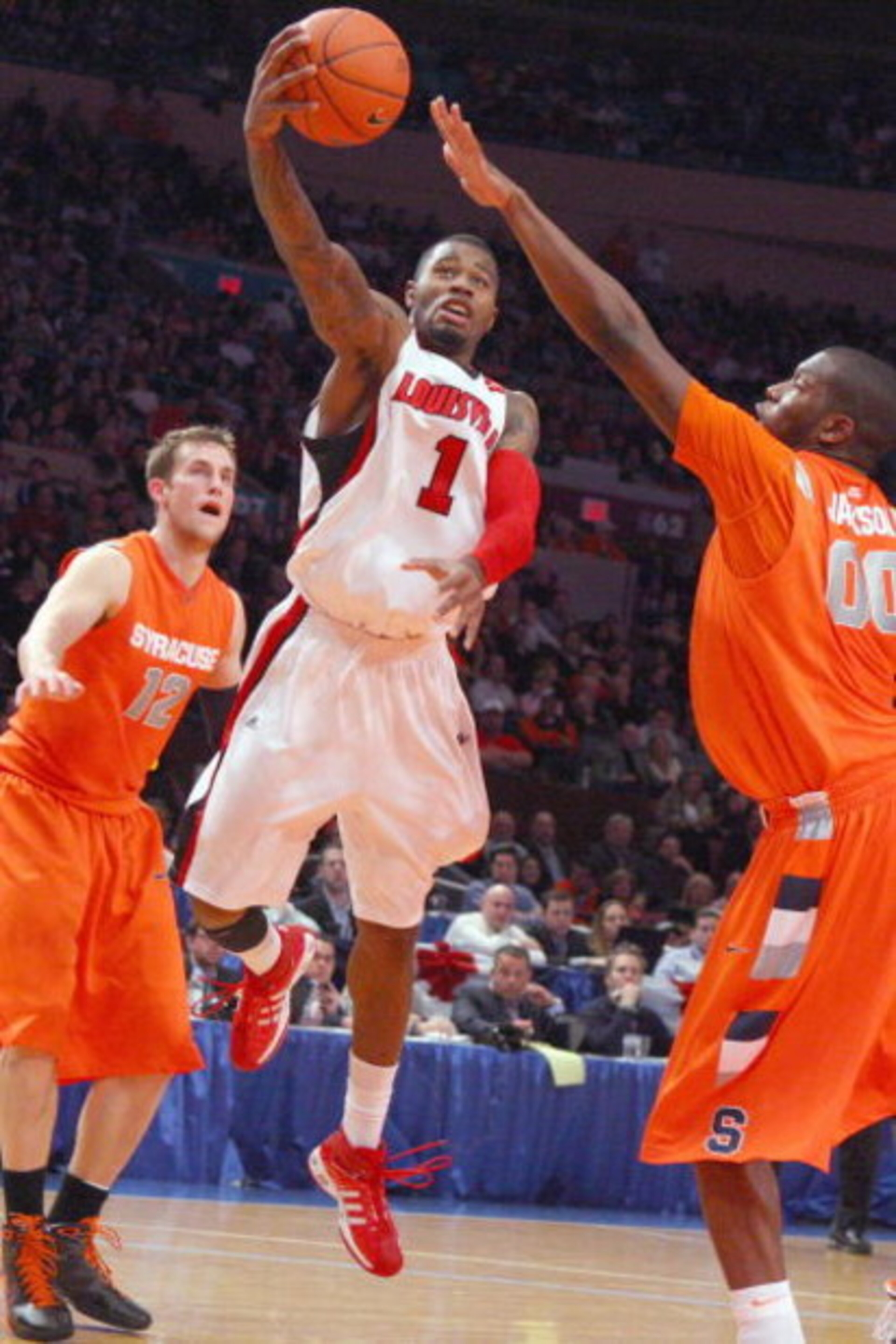 NEW YORK - MARCH 14: Terrence Williams #1 of the Louisville Cardinals puts a shot up against the Syracuse Orange during the championship game of the Big East Tournament at Madison Square Garden on March 14, 2009 in New York City. (Photo by Jim McIsaac/G NEW YORK - MARCH 14: Terrence Williams #1 of the Louisville Cardinals puts a shot up against the Syracuse Orange during the championship game of the Big East Tournament at Madison Square Garden on March 14, 2009 in New York City. (Photo by Jim McIsaac/G