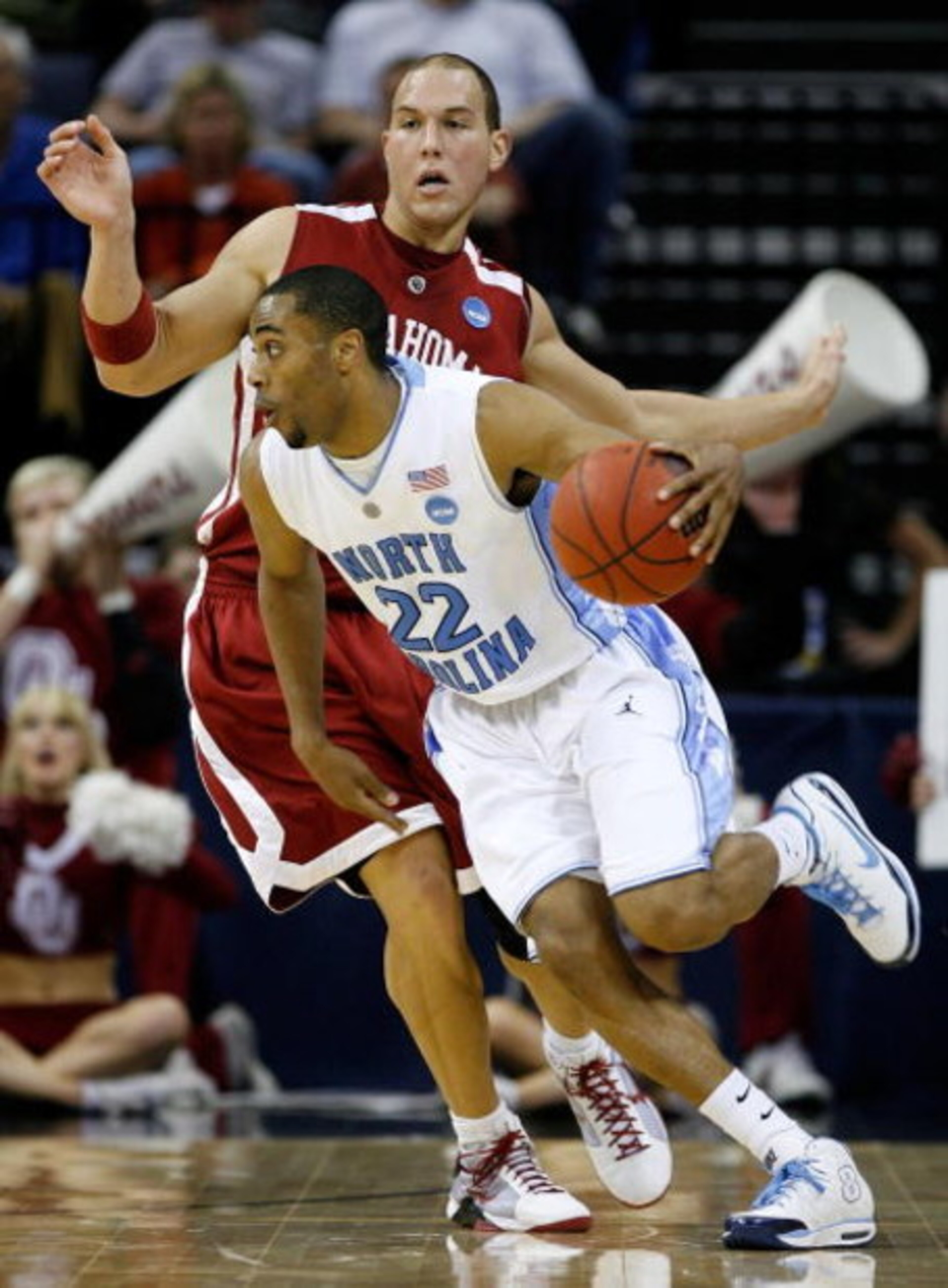 MEMPHIS, TN - MARCH 29: Wayne Ellington #22 of the North Carolina Tar Heels moves the ball as he is covered by Taylor Griffin #32 of the Oklahoma Sooners during the NCAA Men's Basketball Tournament South Regional Final at the FedExForum on March 29, 2009 MEMPHIS, TN - MARCH 29: Wayne Ellington #22 of the North Carolina Tar Heels moves the ball as he is covered by Taylor Griffin #32 of the Oklahoma Sooners during the NCAA Men's Basketball Tournament South Regional Final at the FedExForum on March 29, 2009