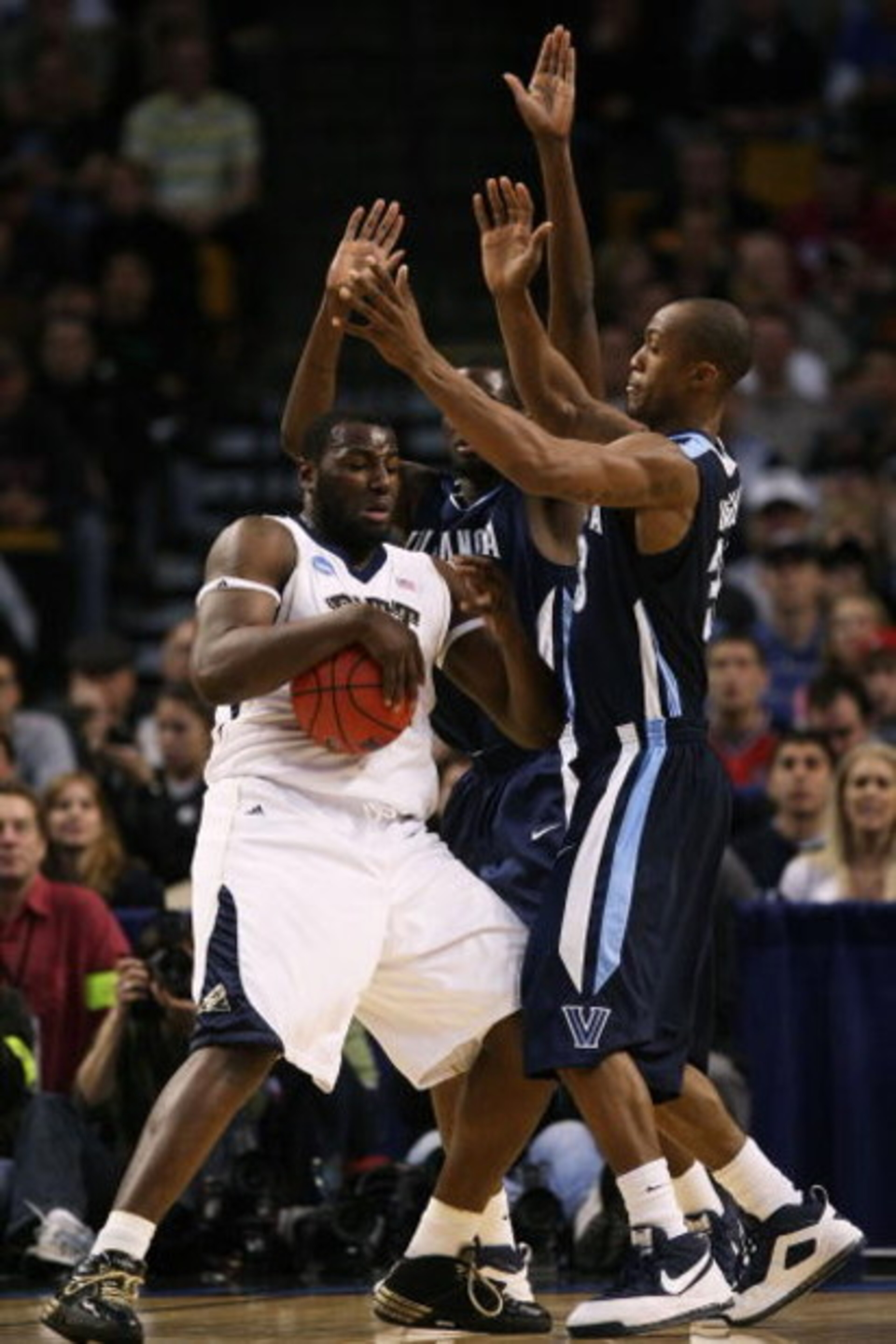BOSTON - MARCH 28: DeJuan Blair #45 of the Pittsburgh Panthers tries to get past Shane Clark #20 and Dante Cunningham #33 of the Villanova Wildcats during the NCAA Men's Basketball Tournament East Regionals at TD Banknorth Garden on March 28, 2009 in Bos BOSTON - MARCH 28: DeJuan Blair #45 of the Pittsburgh Panthers tries to get past Shane Clark #20 and Dante Cunningham #33 of the Villanova Wildcats during the NCAA Men's Basketball Tournament East Regionals at TD Banknorth Garden on March 28, 2009 in Bos