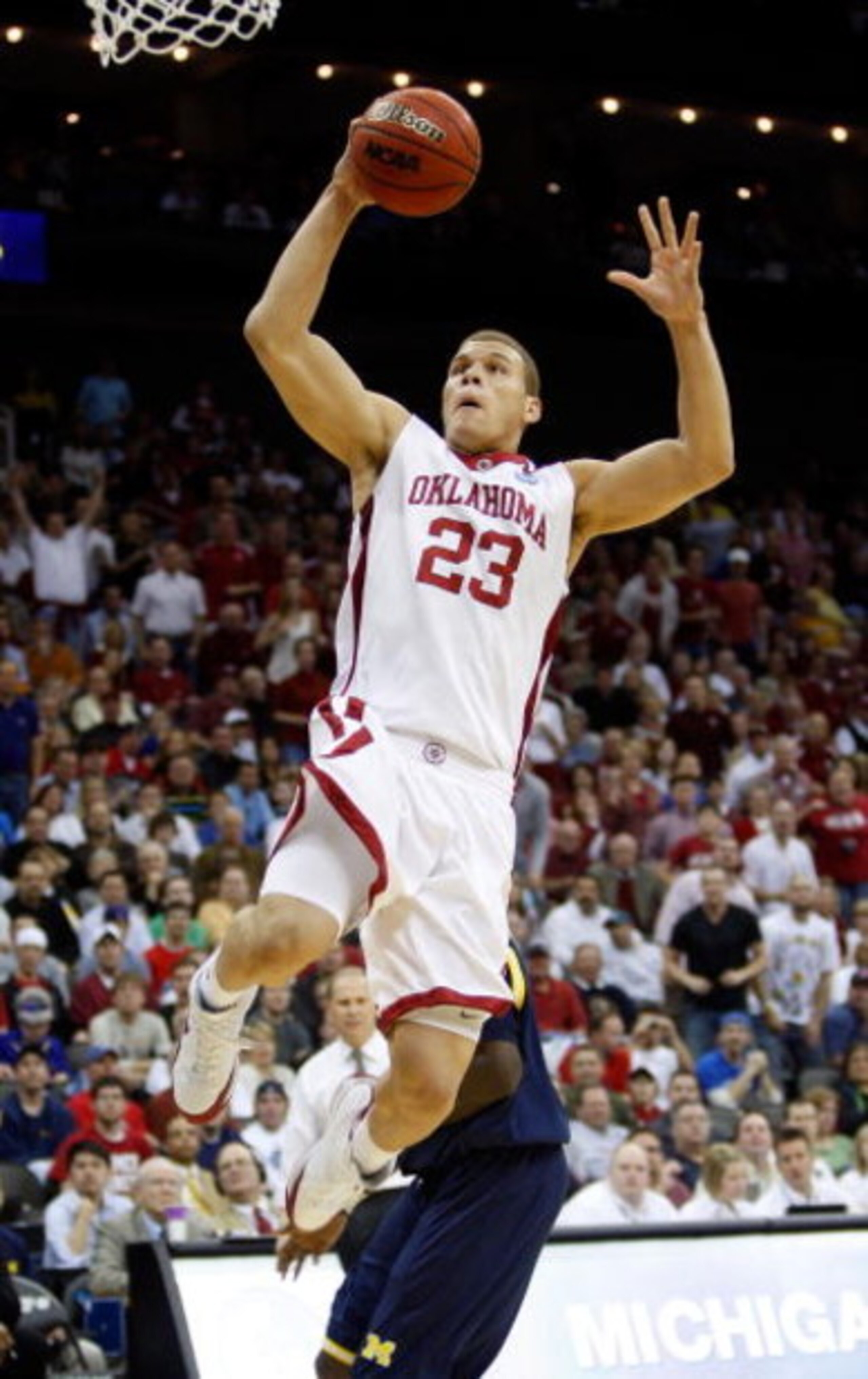 KANSAS CITY, MO - MARCH 21:  Blake Griffin #23 of the Oklahoma Sooners jumps to the net for a lay up against the Michigan Wolverines during the second round of the NCAA Division I Men's Basketball Tournament at the Sprint Center on March 21, 2009 in Kansa