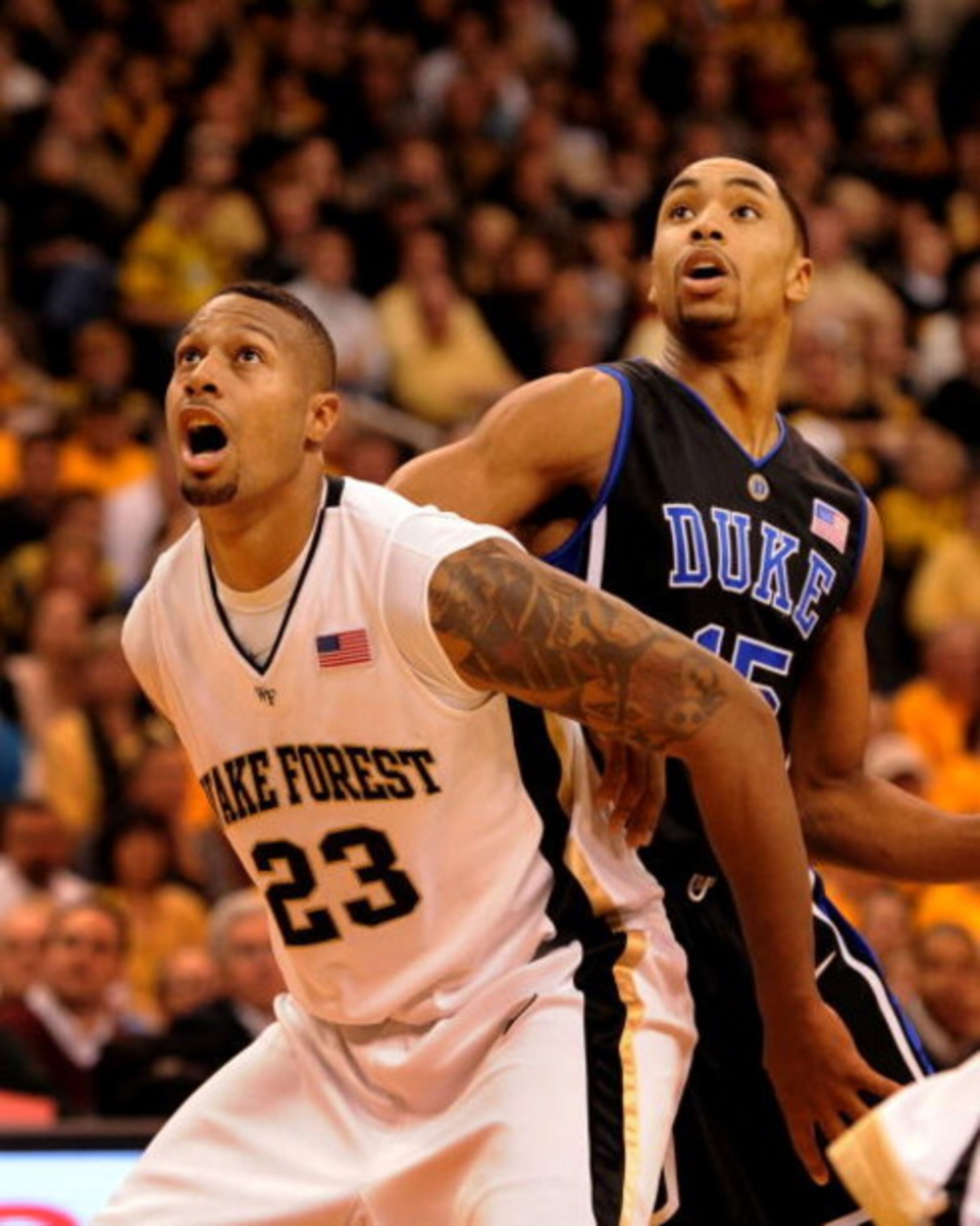 WINSTON-SALEM, NC - JANUARY 28: James Johnson #23 of the Wake Forest Demon Deacons battles for a position with Gerald Henderson #15 of the Duke Blue Devils in the second half of the game at Lawrence Joel Coliseum on January 28, 2009 in Winston-Salem, Nort