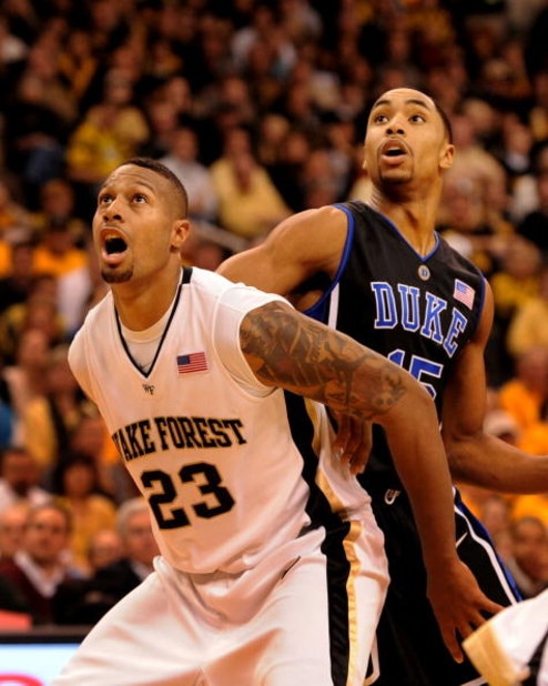 WINSTON-SALEM, NC - JANUARY 28: James Johnson #23 of the Wake Forest Demon Deacons battles for a position with Gerald Henderson #15 of the Duke Blue Devils in the second half of the game at Lawrence Joel Coliseum on January 28, 2009 in Winston-Salem, Nort