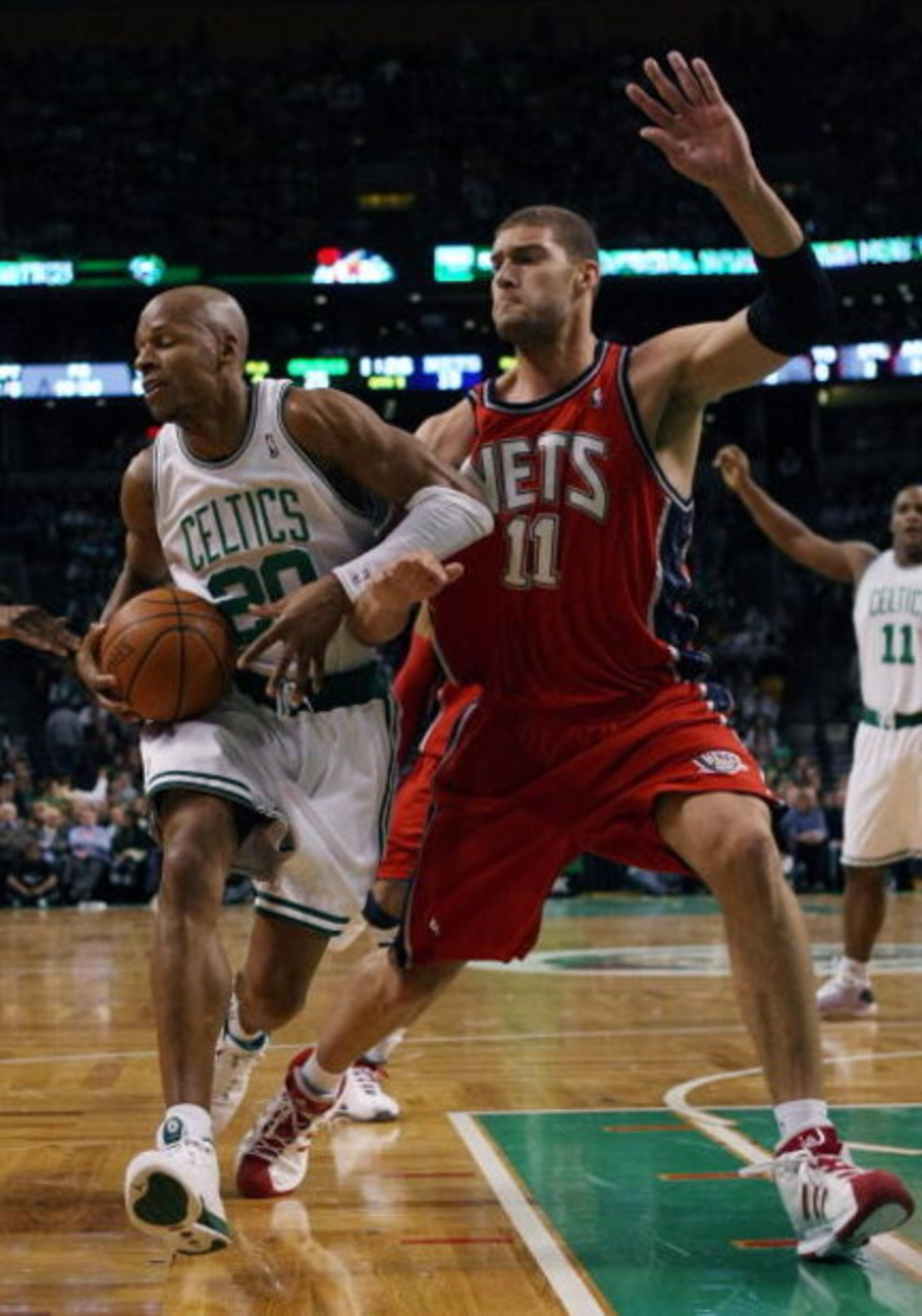 BOSTON - JANUARY 14:  Ray Allen #20 of the Boston Celtics tries to get to the net as Brook Lopez #11 of the New Jersey Nets defends at TD Banknorth Garden January 14, 2009 in Boston, Massachusetts.  NOTE TO USER: User expressly acknowledges and agrees tha