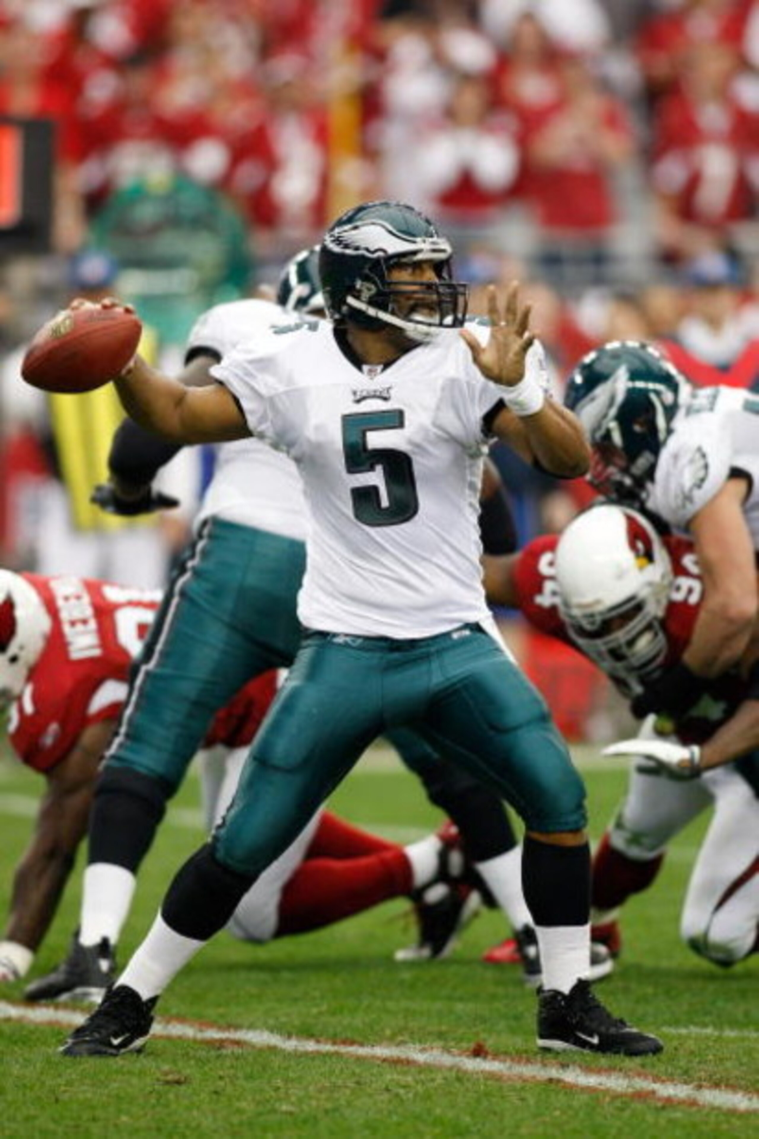 GLENDALE, AZ - JANUARY 18:  Quarterback Donovan McNabb #5 of the Philadelphia Eagles looks to throw the ball in the second quarter during the NFC championship game against the Arizona Cardinals on January 18, 2009 at University of Phoenix Stadium in Glend