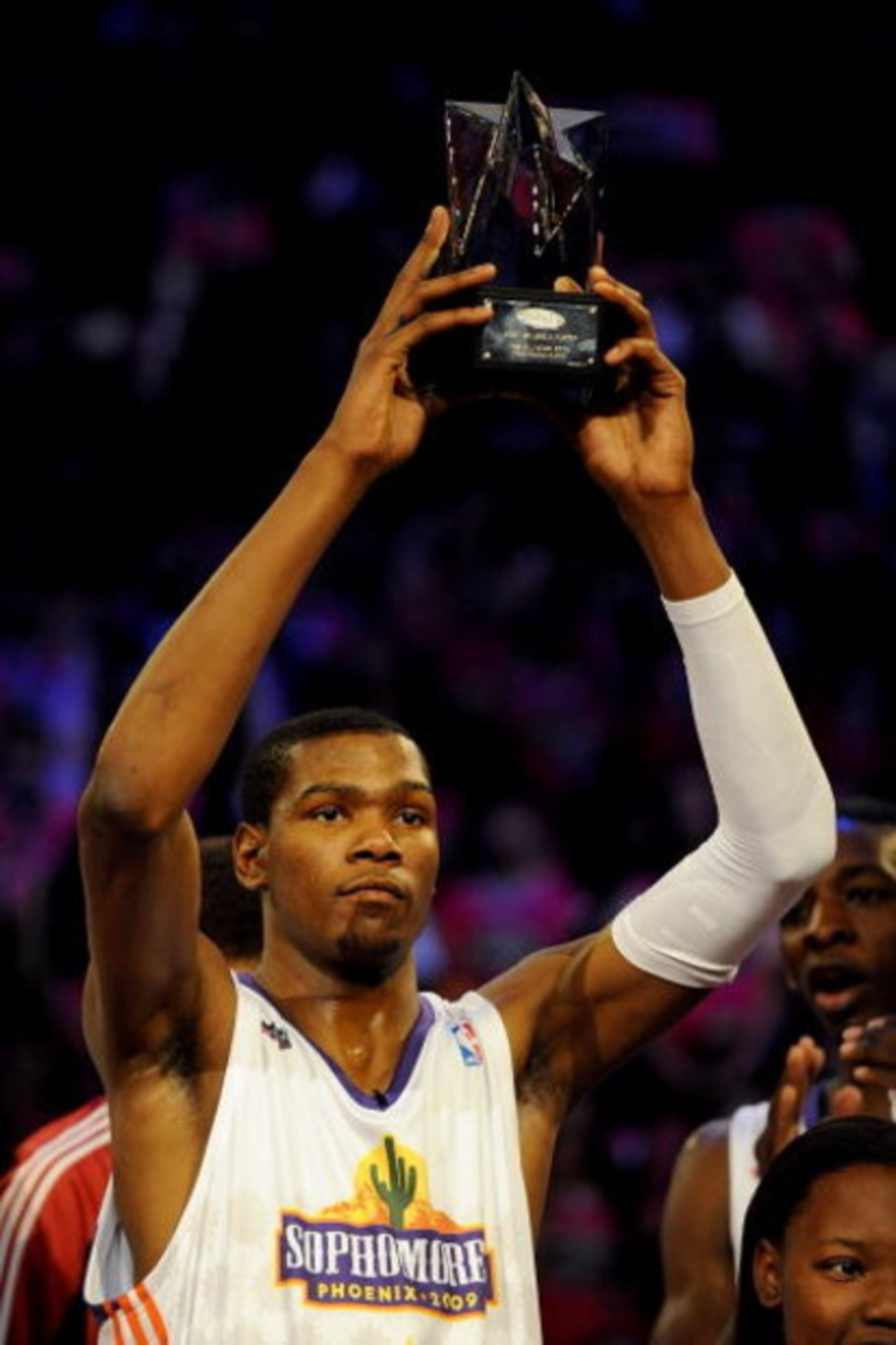 PHOENIX - FEBRUARY 13:  Kevin Durant #35 of the Sophomore team holds up the MVP trophy after the Sophomores won the T-Mobile Rookie Challenge & Youth Jam part of 2009 NBA All-Star Weekend at US Airways Center on February 13, 2009 in Phoenix, Arizona.  NOT
