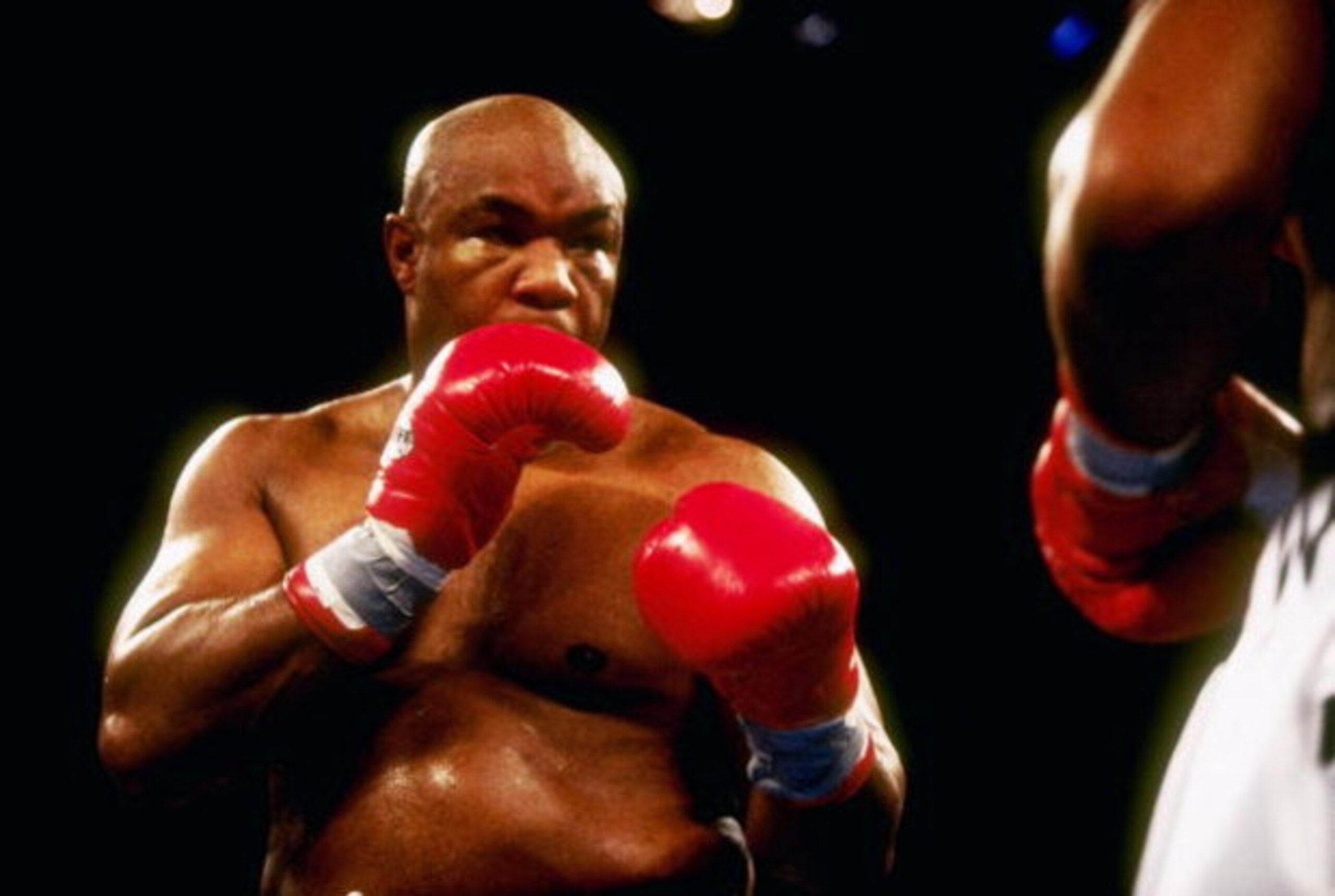 22 Nov 1997:  George Foreman in action during his bout versus Shannon Briggs at Mark Etess Arena in the Taj Mahal Hotel in Atlantic City, New Jersey.  Briggs won the bout by way of decision after 10 rounds. Mandatory Credit: Al Bello  /Allsport