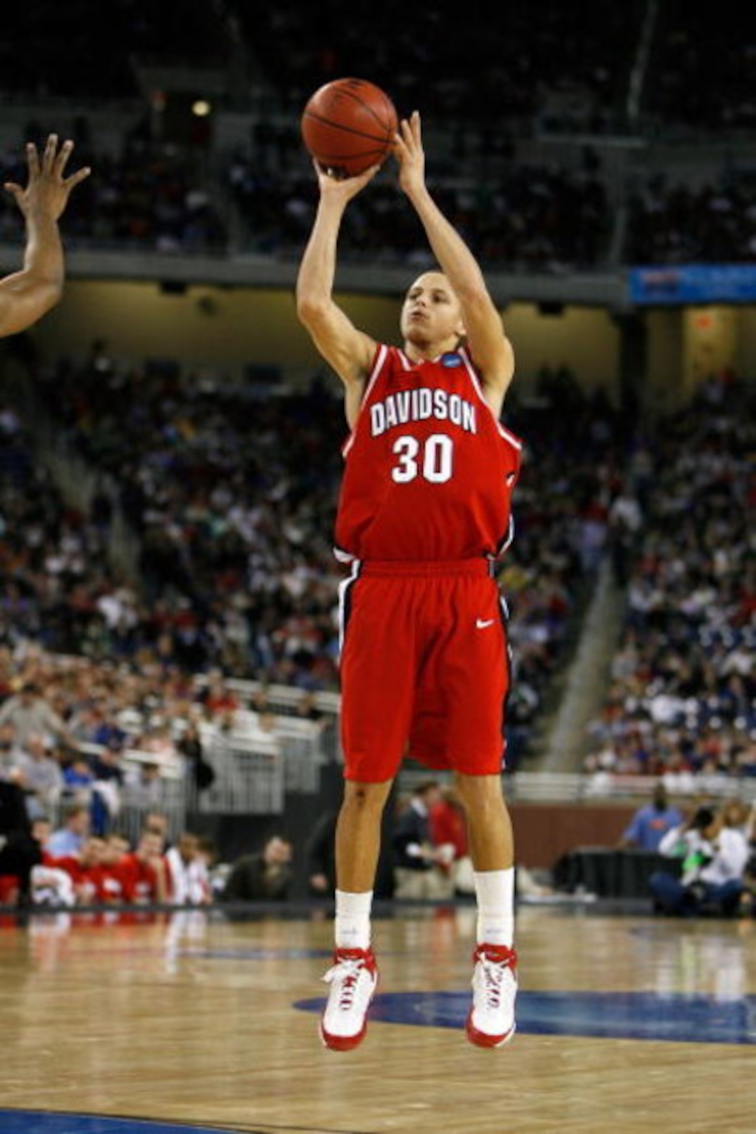 DETROIT - MARCH 28:  Stephen Curry #30 of the Davidson Wildcats attempts a shot against the Wisconsin Badgers during the Midwest Regional Semifinal of the 2008 NCAA Division I Men's Basketball Tournament at Ford Field on March 28, 2008 in Detroit, Michiga