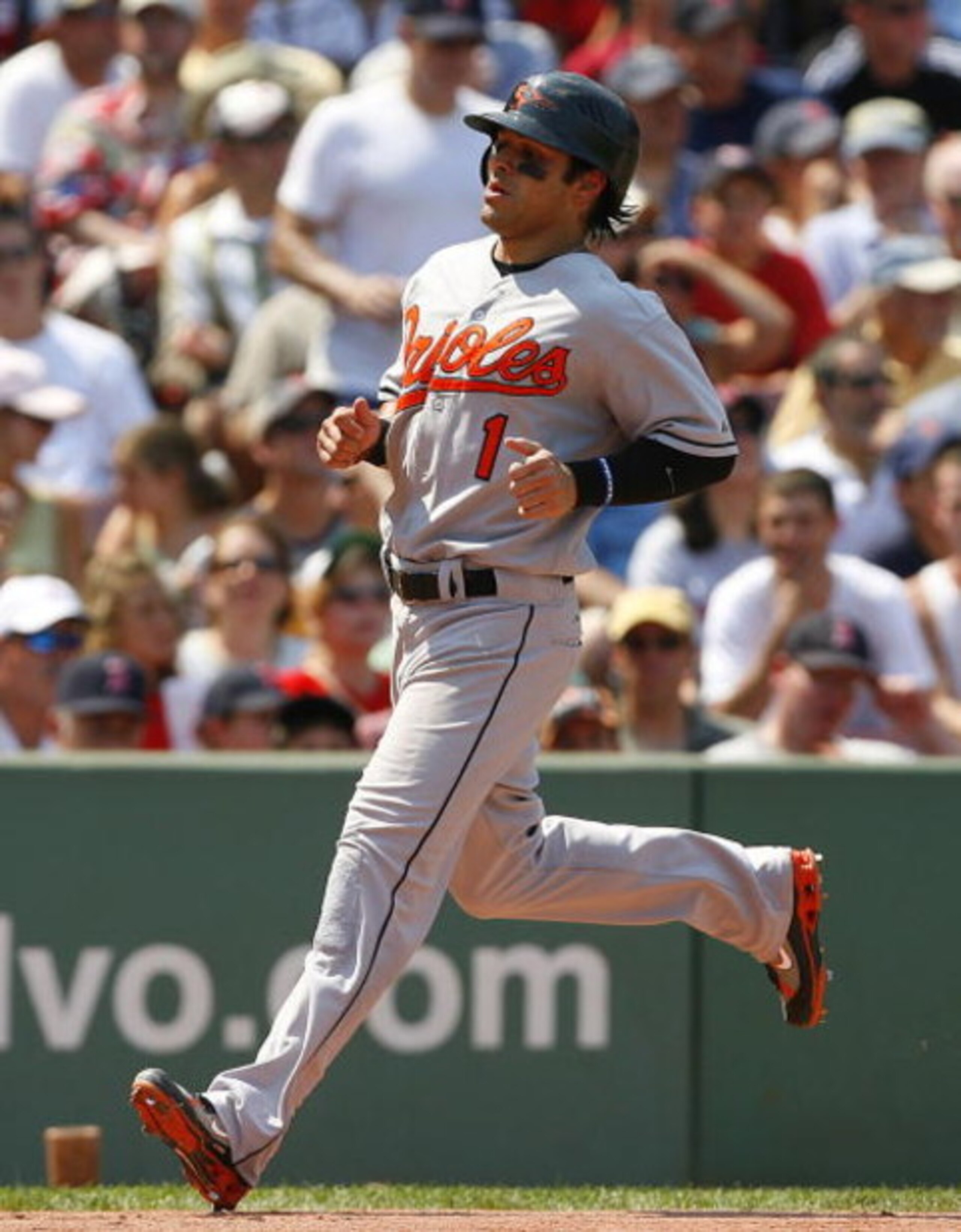 BOSTON - AUGUST 2:  Brian Roberts #1 of the Baltimore Orioles scores a run against the Boston Red Sox on August 2, 2007 at Fenway Park in Boston, Massachusetts. (Photo by Jim Rogash/Getty Images)  