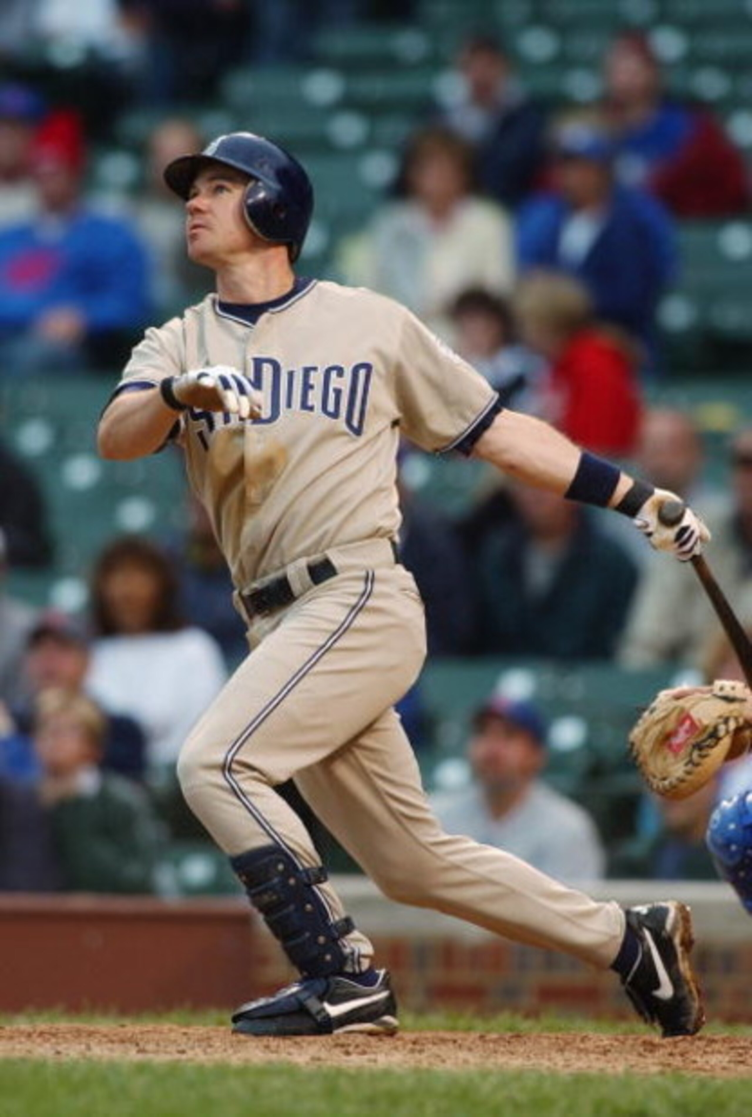 CHICAGO - AUGUST 12:  Mark Loretta #8 of the San Diego Padres watches the flight of the ball as he follows through on a swing during the game against the Chicago Cubs at Wrigley Field on August 12, 2004 in Chicago, Illinois.  The Padres won 5-4. (Photo by