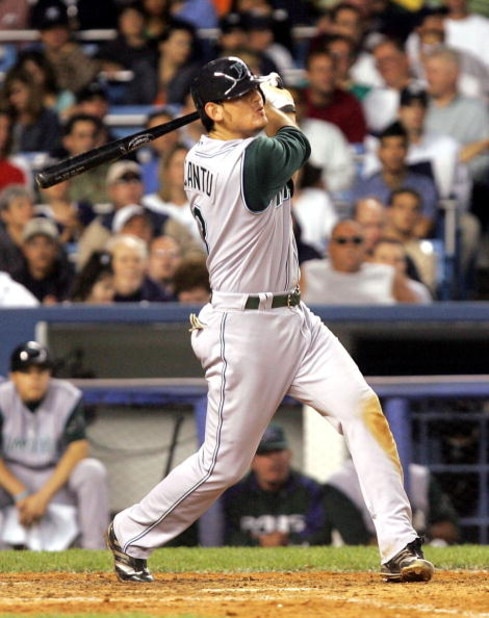 BRONX, NY - JUNE 20:  Jorge Cantu #3 of the Tampa Bay Devil Rays hits an RBI double in the sixth inning scoring teammate Julio Lugo against the New York Yankees on June 20, 2005 at Yankee Stadium in the Bronx borough of New York City. The Devil Rays ended