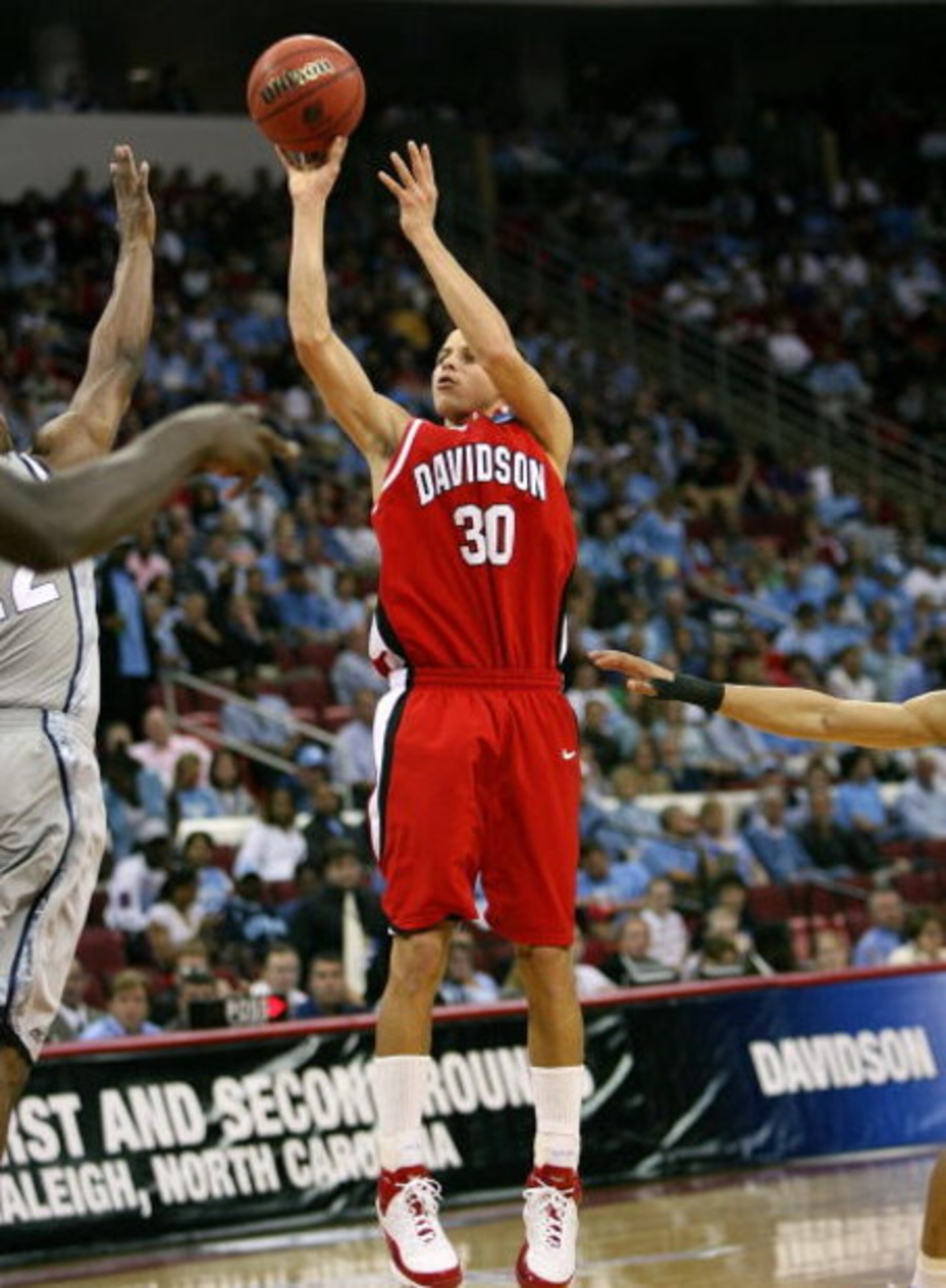 RALEIGH, NC - MARCH 23:  Stephen Curry #30 of the Davidson Wildcats shoots the jump shot against the Georgetown Hoyas during the 2nd round of the East Regional of the 2008 NCAA Men's Basketball Tournament at RBC Center on March 23, 2008 in Raleigh, North 