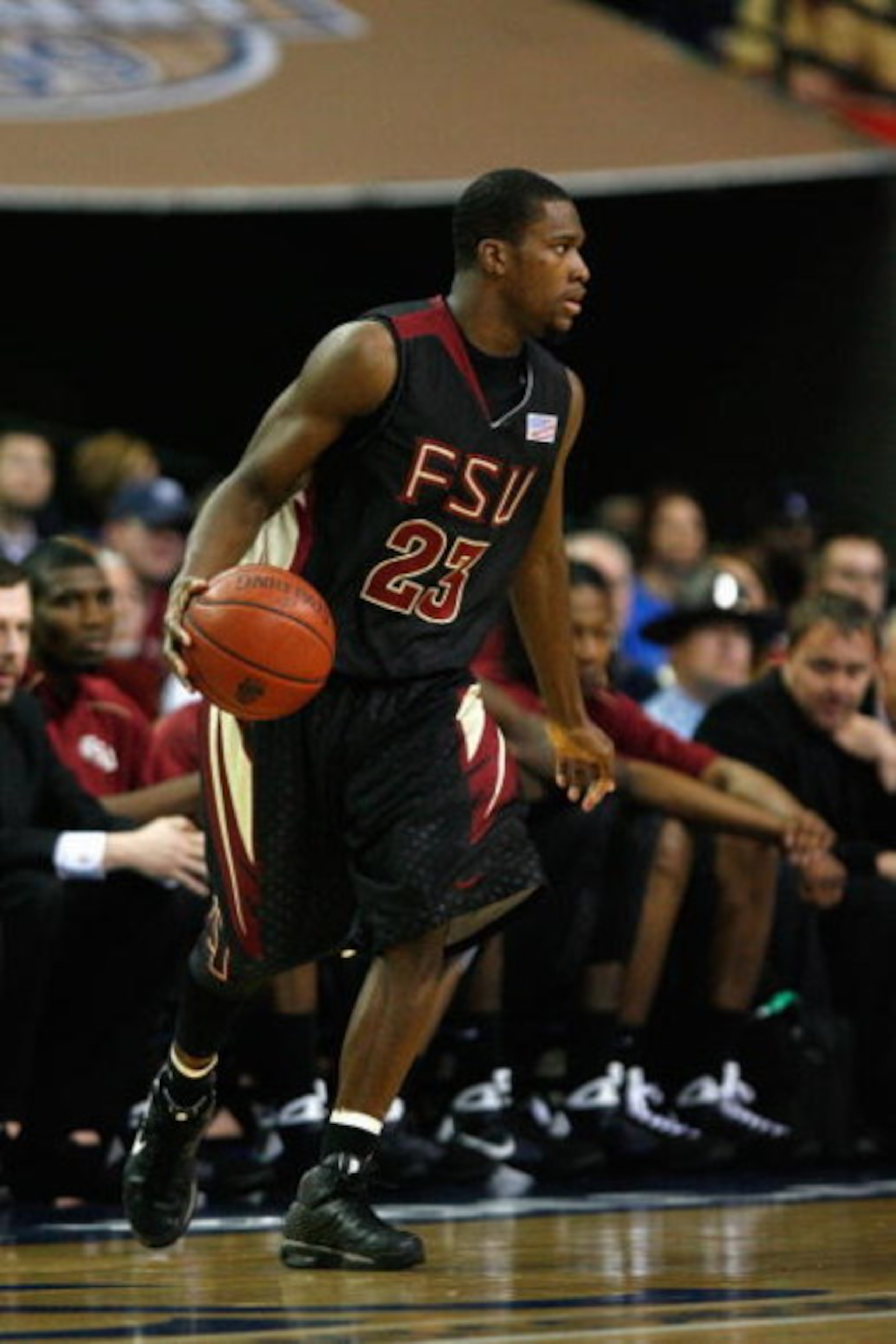 ATLANTA - MARCH 15:  Toney Douglas #23 of the Florida State Seminoles dribbles against the Duke Blue Devils during the championship game of the 2009 ACC Men's Basketball Tournament on March 15, 2009 at the Georgia Dome in Atlanta, Georgia.  (Photo by Kevi