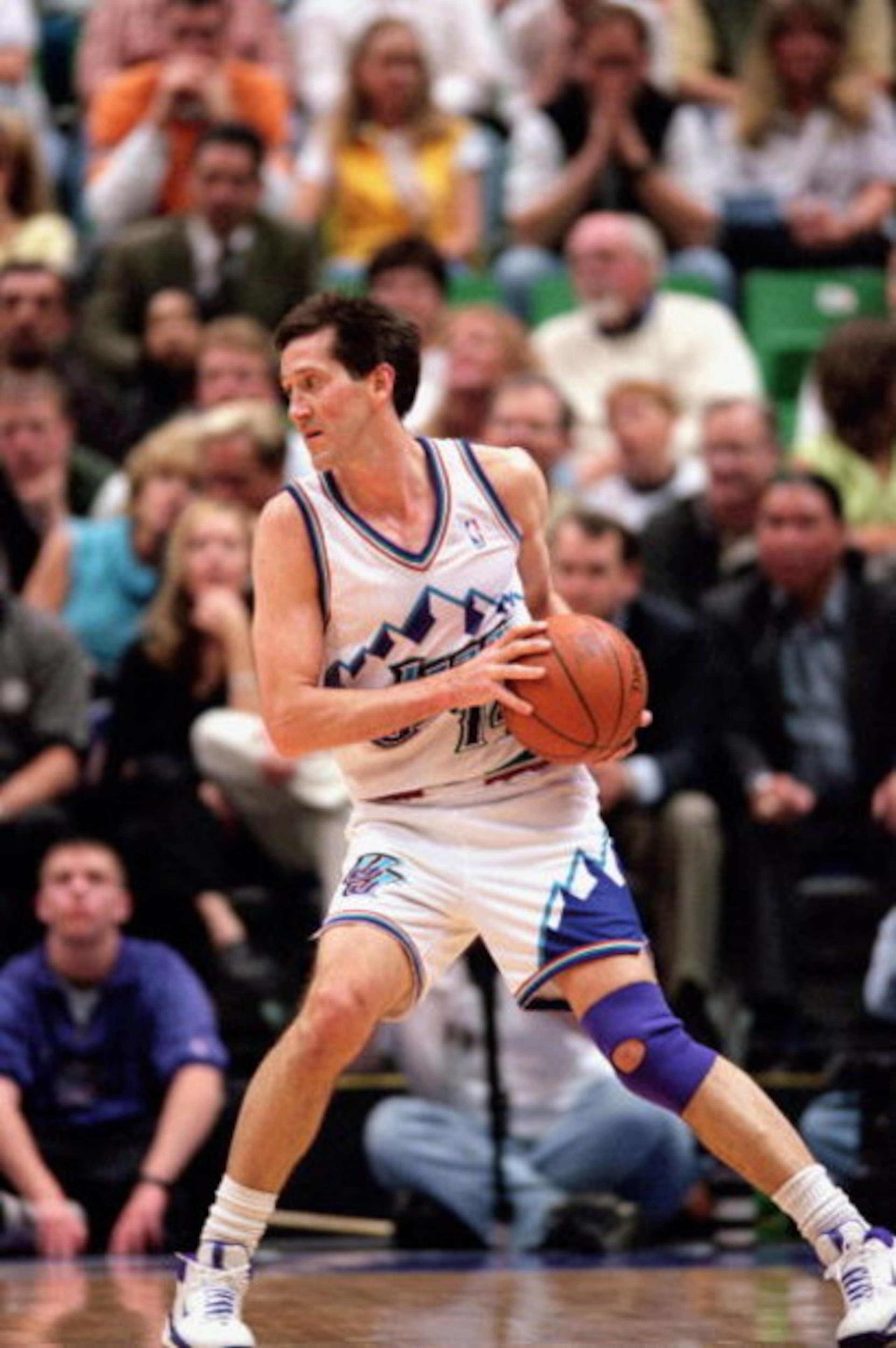 27 Mar 2000:  Jeff Hornacek #14 of the Utah Jazz moves with the ball during a game against the Dallas Mavericks at the Delta Center in Salt Lake City, Utah. The Mavericks defeated the Jazz 113-105.     Mandatory Credit: Otto Greule Jr.  /Allsport