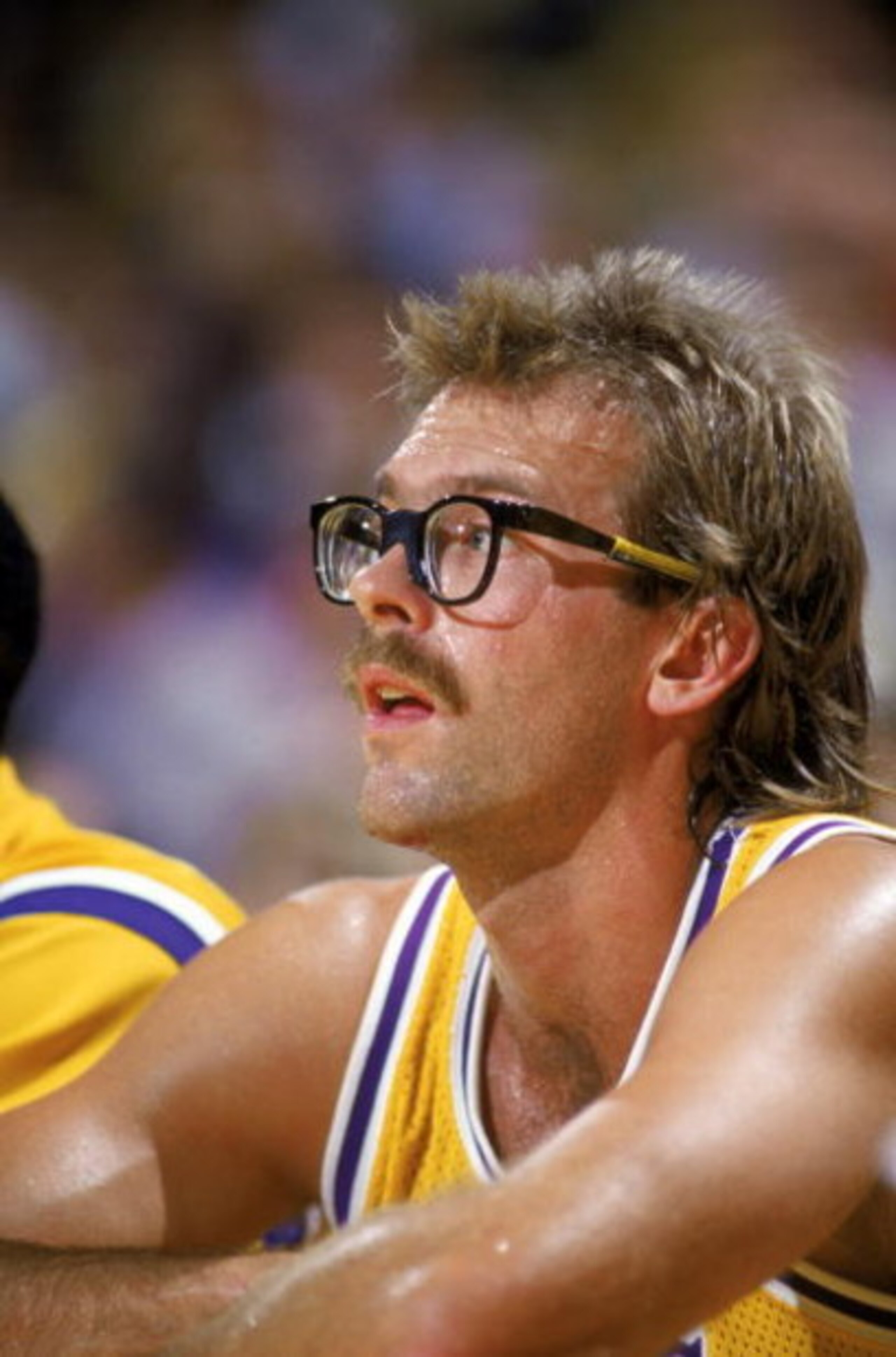 LOS ANGELES - 1988:  Kurt Rambis #31 of the Los Angeles Lakers sits on the bench during an NBA game at the Great Western Forum in Los Angeles, California in 1988. (Photo by Mike Powell/Getty Images)