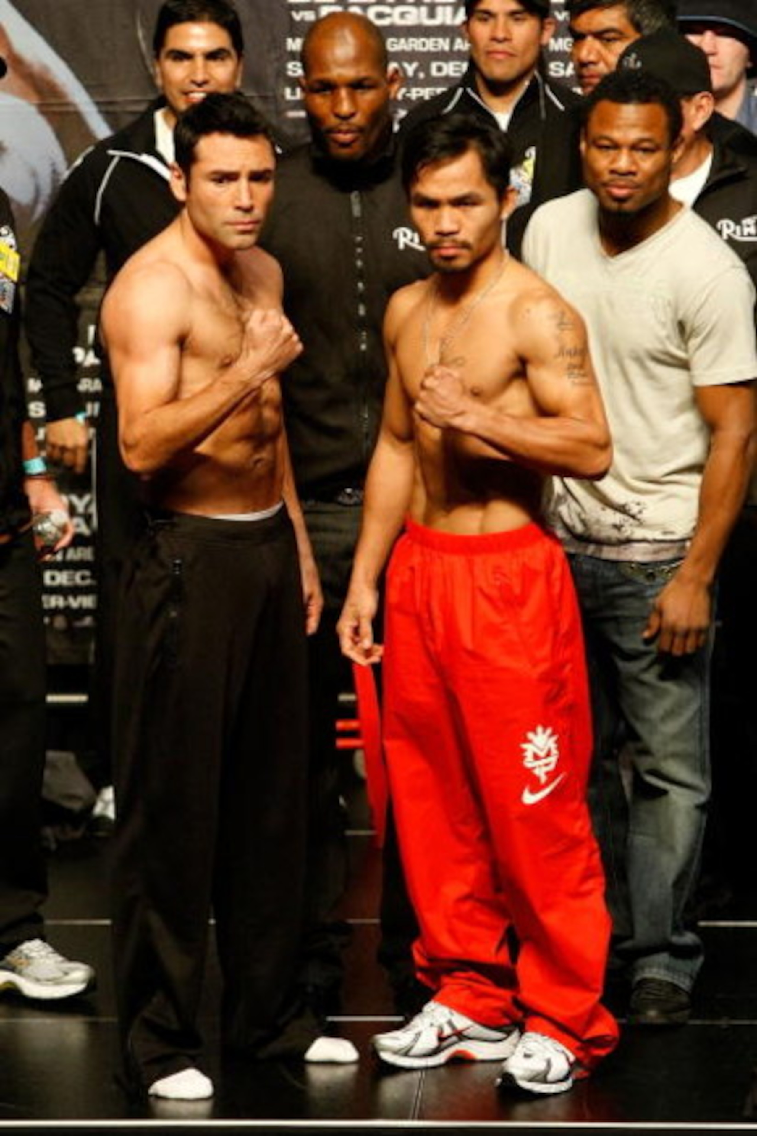 LAS VEGAS - DECEMBER 05:  (L-R) Oscar De La Hoya and Manny Pacquiao of the Philippines pose during the weigh-in for their welterweight fight at the MGM Grand Garden Arena December 5, 2008 in Las Vegas, Nevada. De La Hoya fights Pacquiao December 6th.  (Ph