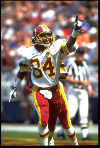 13 SEP 1992:  WASHINGTON REDSKINS WIDE RECEIVER GARY CLARK POINTS TO THE CROWD IN CELEBRATION DURING A 24-17 VICTORY OVER THE ATLANTA FALCONS AT RFK STADIUM IN WASHINGTON D.C.