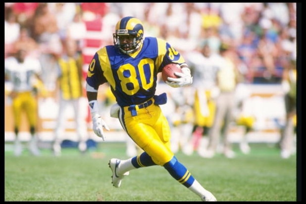 24 Sep 1989: Wide receiver Henry Ellard of the Los Angeles Rams moves the ball during a game against the Green Bay Packers at Anaheim Stadium in Anaheim, California. The Rams won the game, 41-38.
