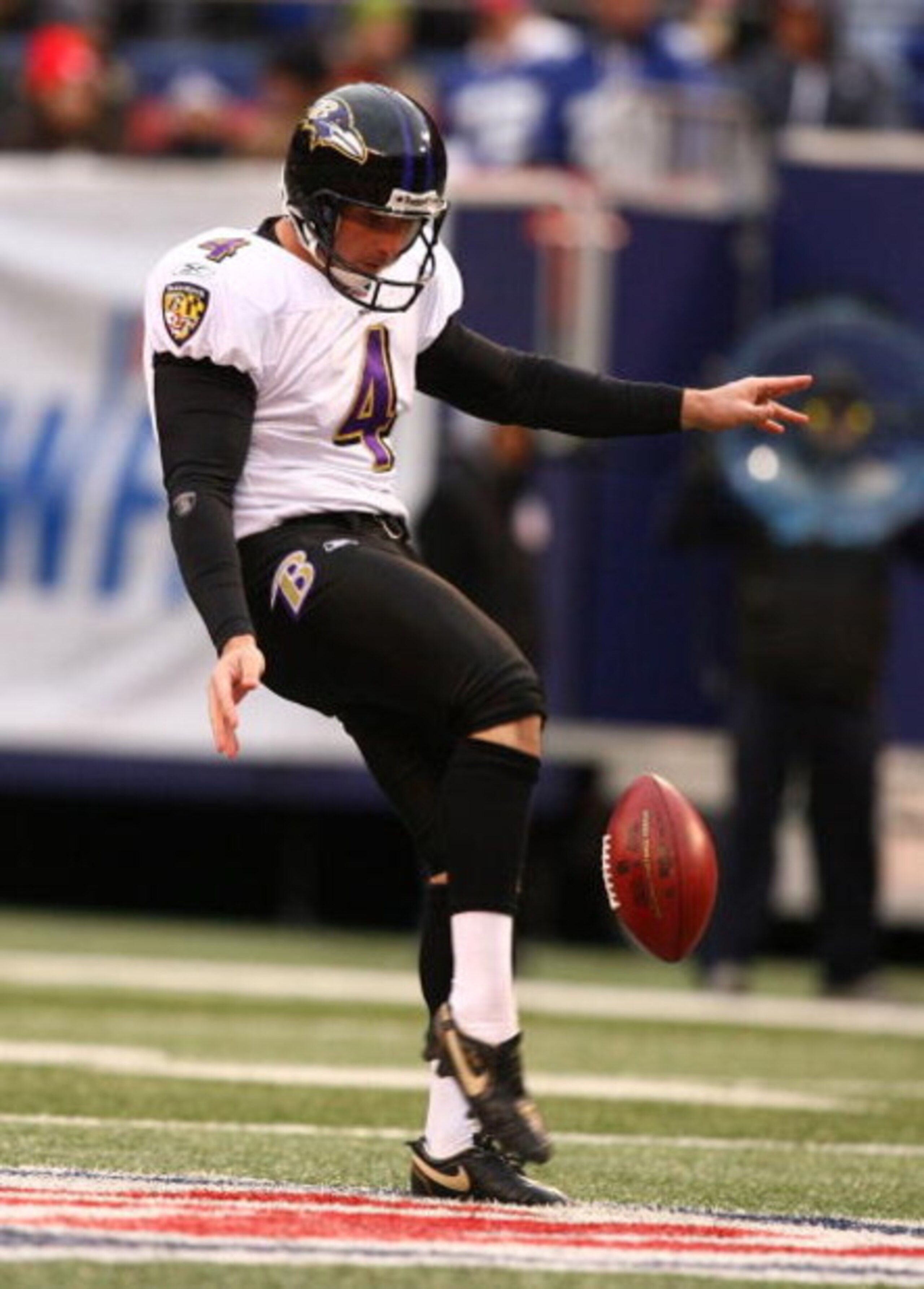 EAST RUTHERFORD, NJ - NOVEMBER 16:  Sam Koch #4 of the Baltimore Ravens in action against The New York Giants during their game on November 16, 2008 at Giants Stadium in East Rutherford, New Jersey.  (Photo by Al Bello/Getty Images)