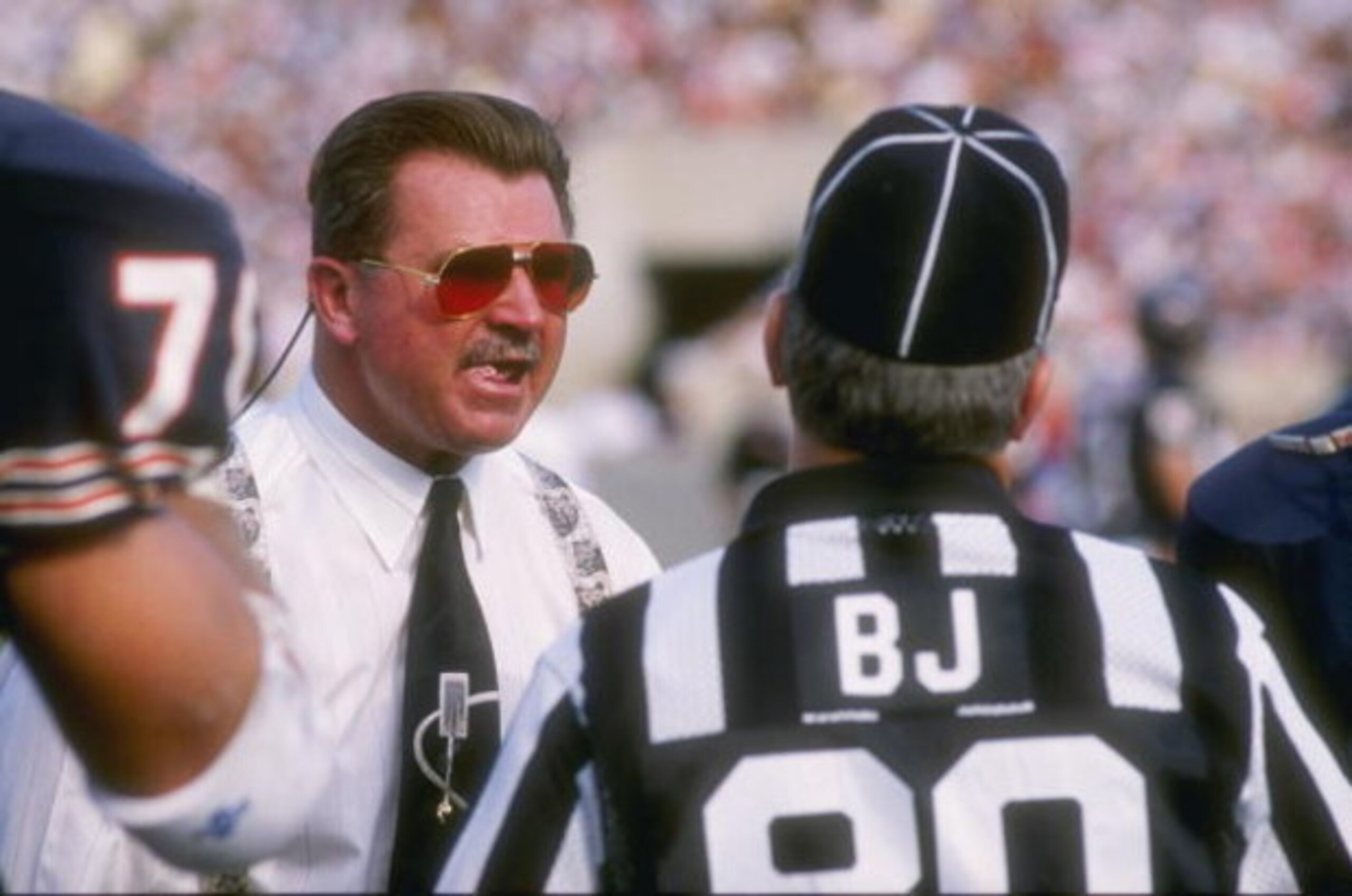 15 Oct 1989:  Head coach Mike Ditka of the Chicago Bears, left, has a few words with an official during the Bears 33-28 loss to the Houston Oilers at Soldier Field in Chicago, Illinois.  Mandatory Credit: Jonathan Daniel  /Allsport