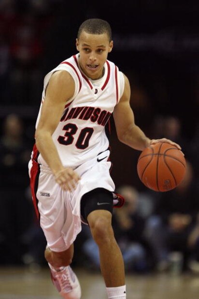 CHARLOTTE, NC - DECEMBER 6:  Stephen Curry #30 of the Davidson Wildcats drives during the game against the North Carolina State Wolfpack at Time Warner Cable Arena on December 6, 2008 in Charlotte, North Carolina. (Photo by Streeter Lecka/Getty Images)