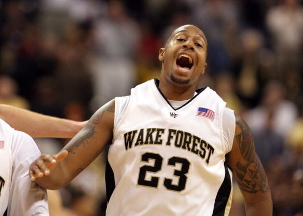 WINSTON-SALEM, NC - FEBRUARY 26: James Johnson #23 of the Wake Forest Demon Deacons reacts to a dunk against the North Carolina State Wolfpack during the Demon Deacons 85-78 victory at Lawrence Joel Coliseum on February 26, 2009 in Winston-Salem, North Ca