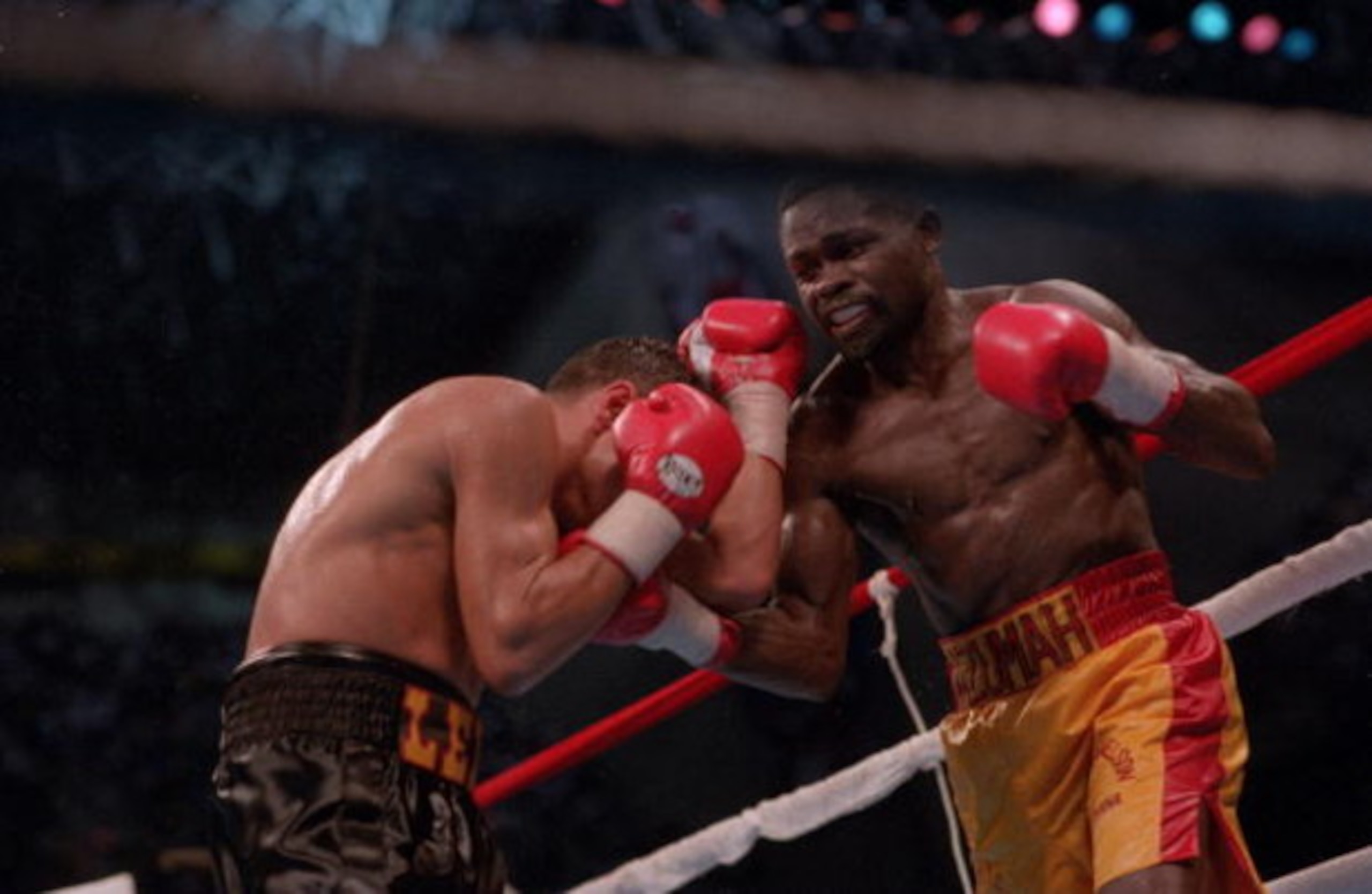 10 Sep 1993:  Boxer Azumah Nelson Throws a punch at Jesse James Leija during the match in San Antonio, Texas.   Mandatory Credit: Holly Stein/ALLSPORT
