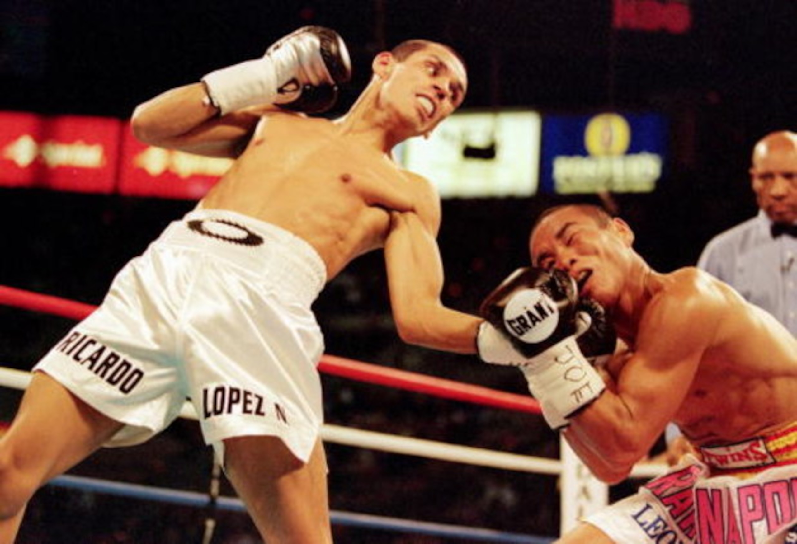 2 Dec 2000: Ricardo Lopez lands a left upper cut during the IBF Junior Flyweight Title fight against Ratanapol Vorapin at the Mandaly Bay Resort in Las Vegas, Nevada. Lopez defeated Vorapin by a Knock Out in the Third RoundMandatory Credit: Al Bello  /All