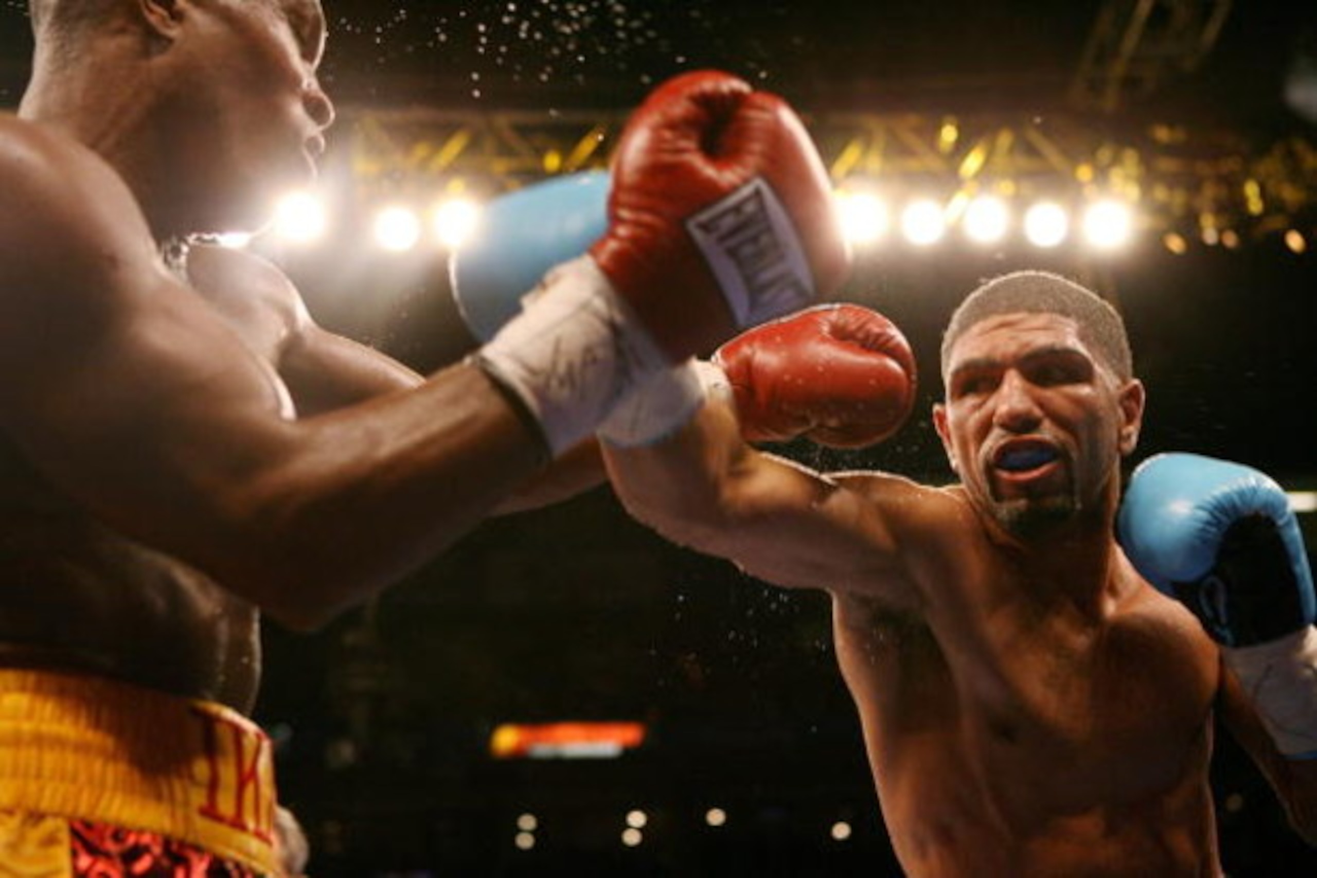 TAMPA, FL - DECEMBER 2:  Winky Wright (R) throws a punch at Ike Quartey during a middleweight fight at the St. Pete Times Forum on December 2, 2006 in Tampa, Florida.  Wright won by unanimous decision.  (Photo by Doug Benc/Getty Images)