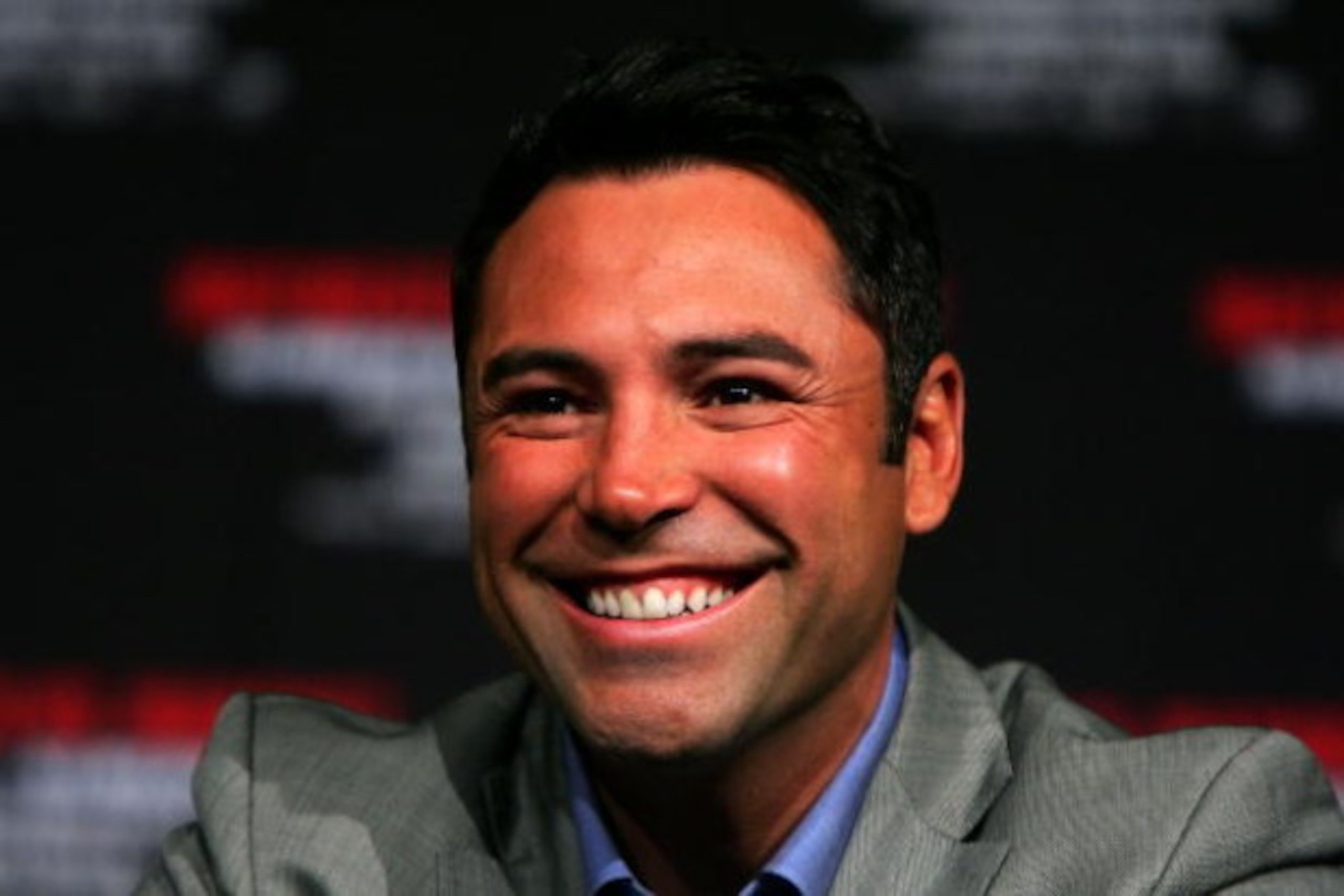 LAS VEGAS - MAY 02:  Promoter Oscar De La Hoya smiles during the news conference annoucning the July 18th fight between boxer Floyd Mayweather Jr. and Juan Manuel Marquez of Mexico in the Hollywood Theatre in the MGM Grand Hotel/Casino May 2, 2009 in Las 