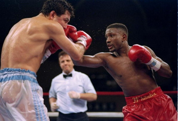 3 Apr 1995:  Pernell Whitaker throws a punch at Julio Cezar Vasquez during a fight.  Mandatory Credit: Simon Bruty  /Allsport
