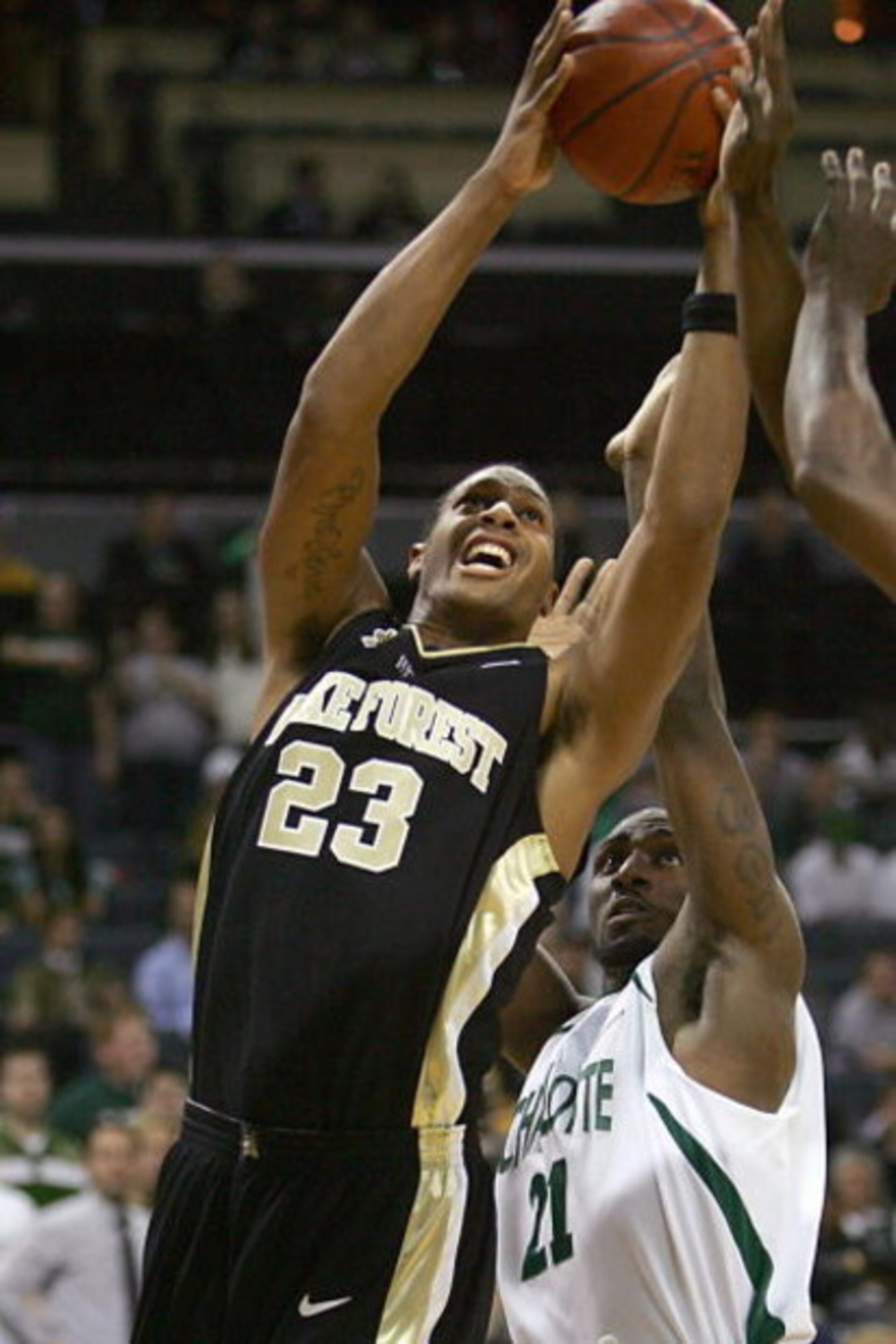 CHARLOTTE - NOVEMBER 29:  James Johnson #23 of the Wake Forest Demon Deacons goes up for the shot during the college basketball game against the UNC Charlotte 49ers at the Bobcats Arena on November 29, 2007 in Charlotte, North Carolina. (Photo by Streeter