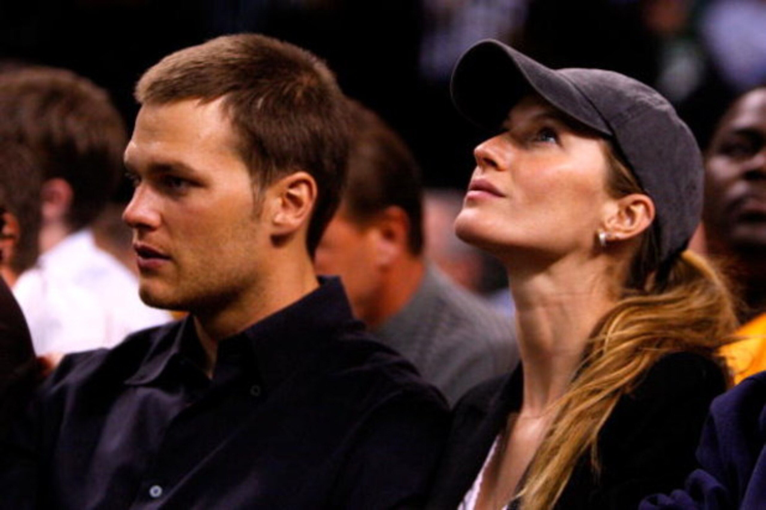 BOSTON - MAY 22:  Tom Brady of the New England Patriots and Giselle Bundchen watch as the Detroit Pistons play against the Boston Celtics during Game Two of the 2008 NBA Eastern Conference finals at the TD Banknorth Garden on May 22, 2008 in Boston, Massa