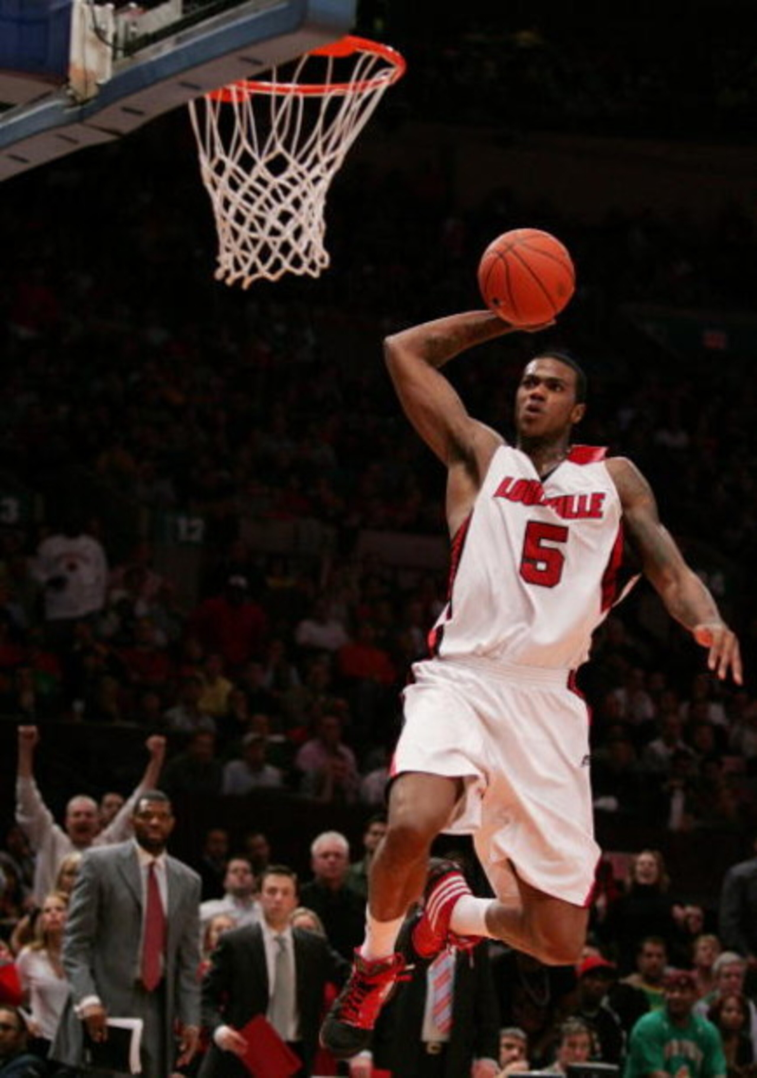 NEW YORK - MARCH 14:  Earl Clark #5 of the Louisville Cardinals drives to the hoop against the Syracuse Orange during the championship game of the Big East Tournament at Madison Square Garden on March 14, 2009 in New York City.  (Photo by Michael Heiman/G