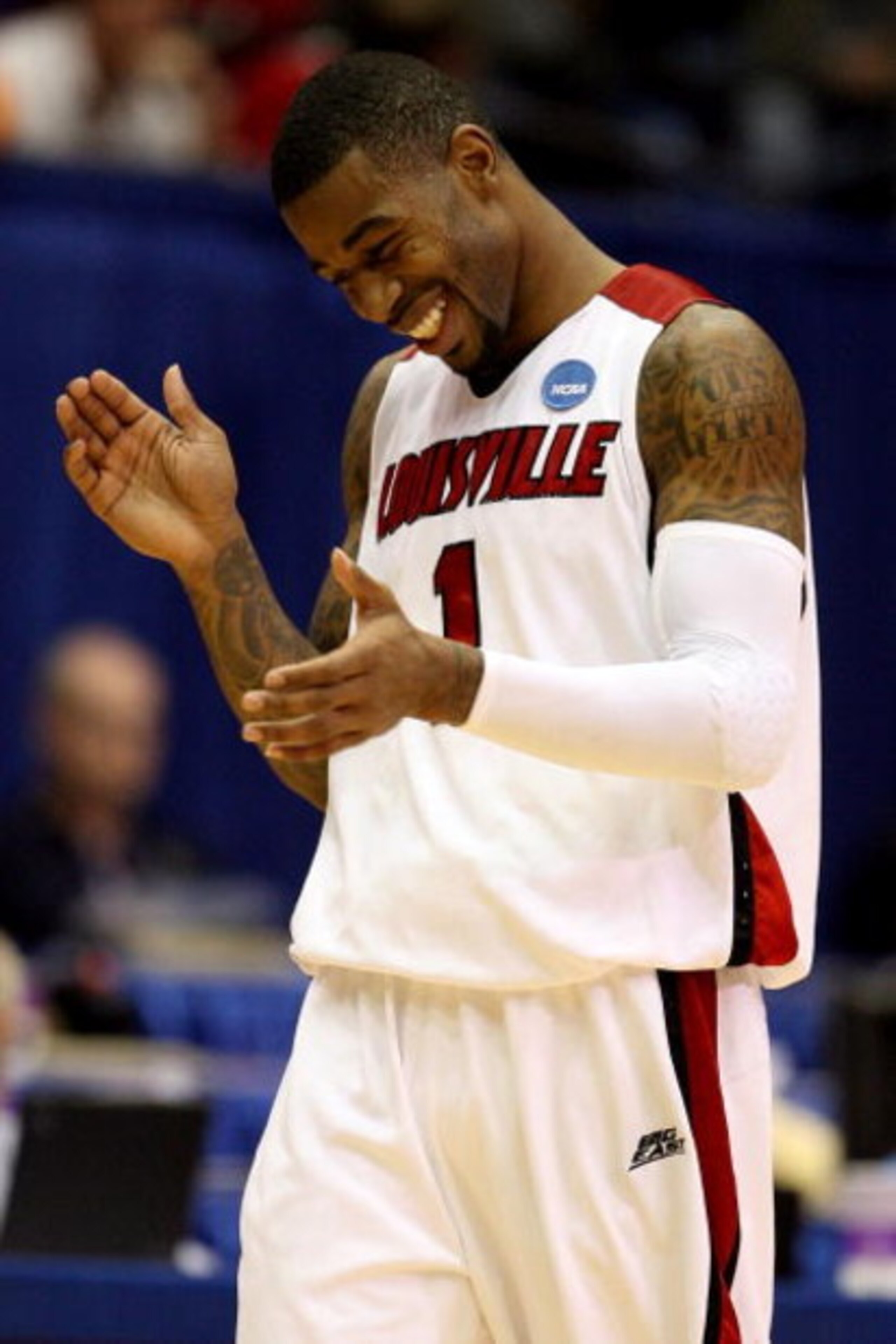 DAYTON, OH - MARCH 22:  Terrence Williams #1 of the Louisville Cardinals reacts after a play late in the game against the Siena Saints during the second round of the NCAA Division I Men's Basketball Tournament at the University of Dayton Arena on March 22