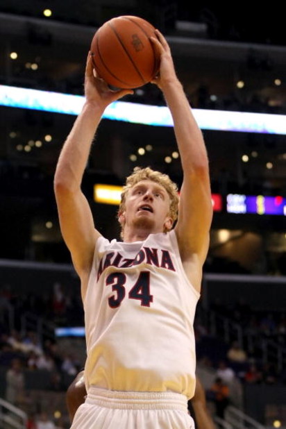 LOS ANGELES, CA - MARCH 12:  Chase Budinger #34 of the Arizona Wildcats shoots over the defense of the Oregon State Beavers during the 2008 Pacific Life Pac-10 Men's Basketball Tournament Day One at Staples Center on March 12, 2008 in Los Angeles, Califor
