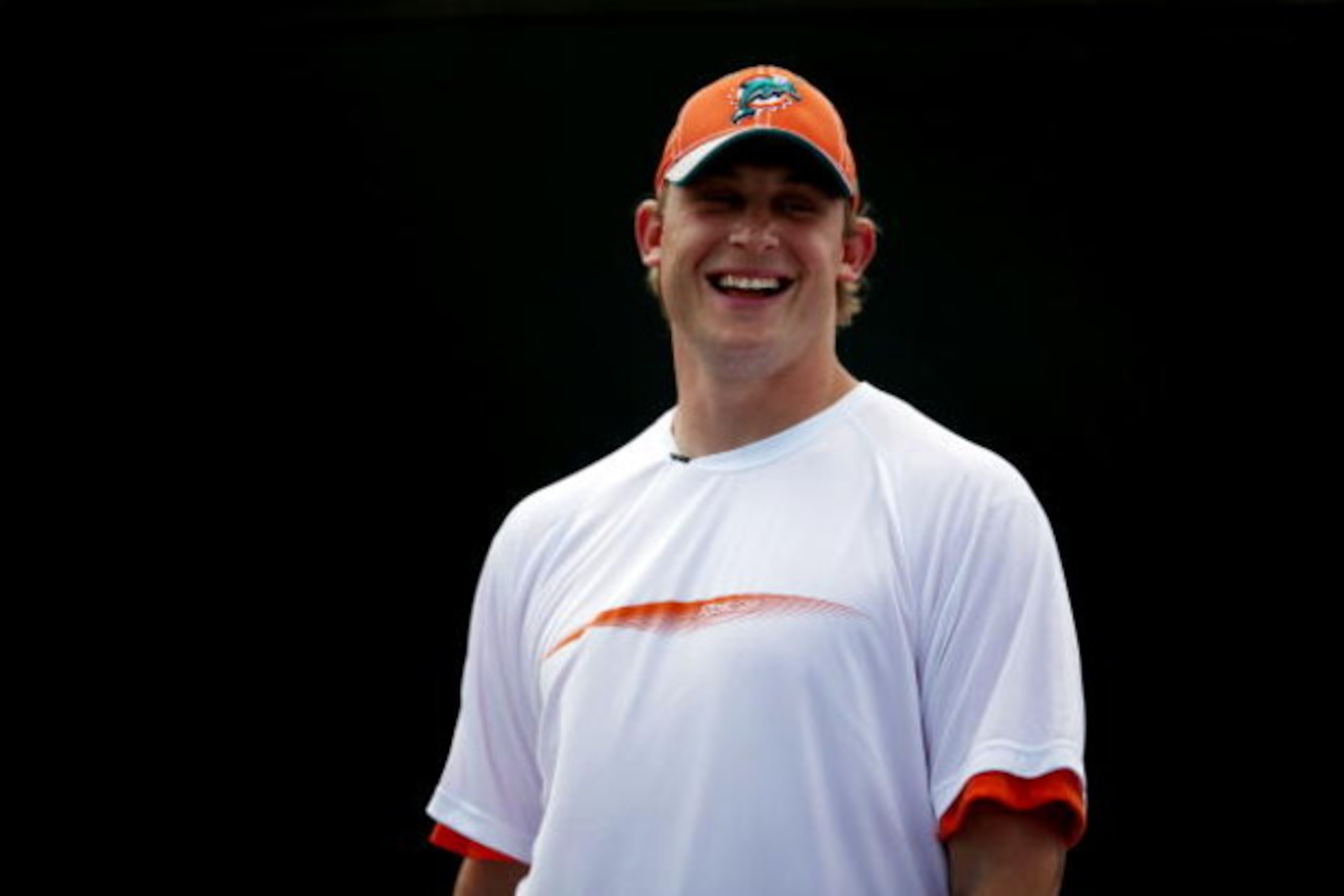 KEY BISCAYNE, FL - MARCH 25:  Quarterback Chad Pennington of the Miami Dolphins plays a friendly match against Nadia Petrova during day three of the Sony Ericsson Open at The Crandon Park Tennis Center on March 25, 2009 in Key Biscayne, Florida.  (Photo b