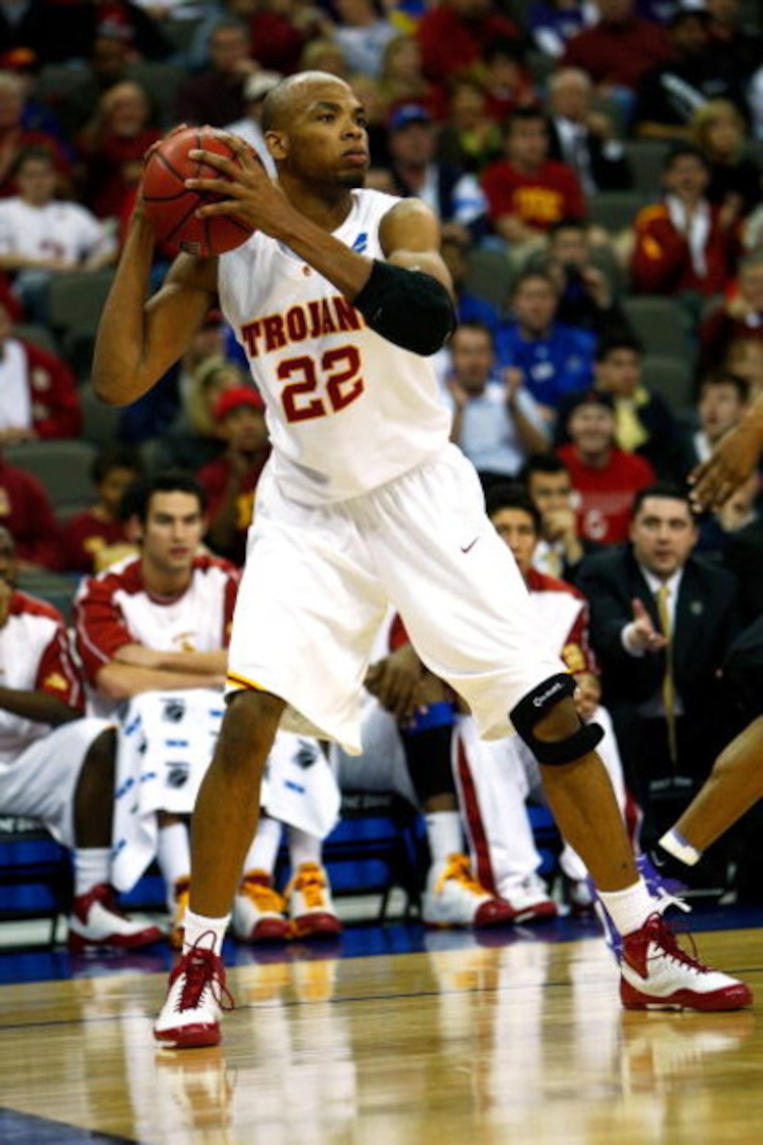 OMAHA, NE - MARCH 20:  Taj Gibson #22 of the USC Trojans looks to pass the ball against the Kansas State Wildcats during the Midwest Region first round of the 2008 NCAA Men's Basketball Tournament on March 20, 2008 at the Qwest Center in Omaha, Nebraska. 
