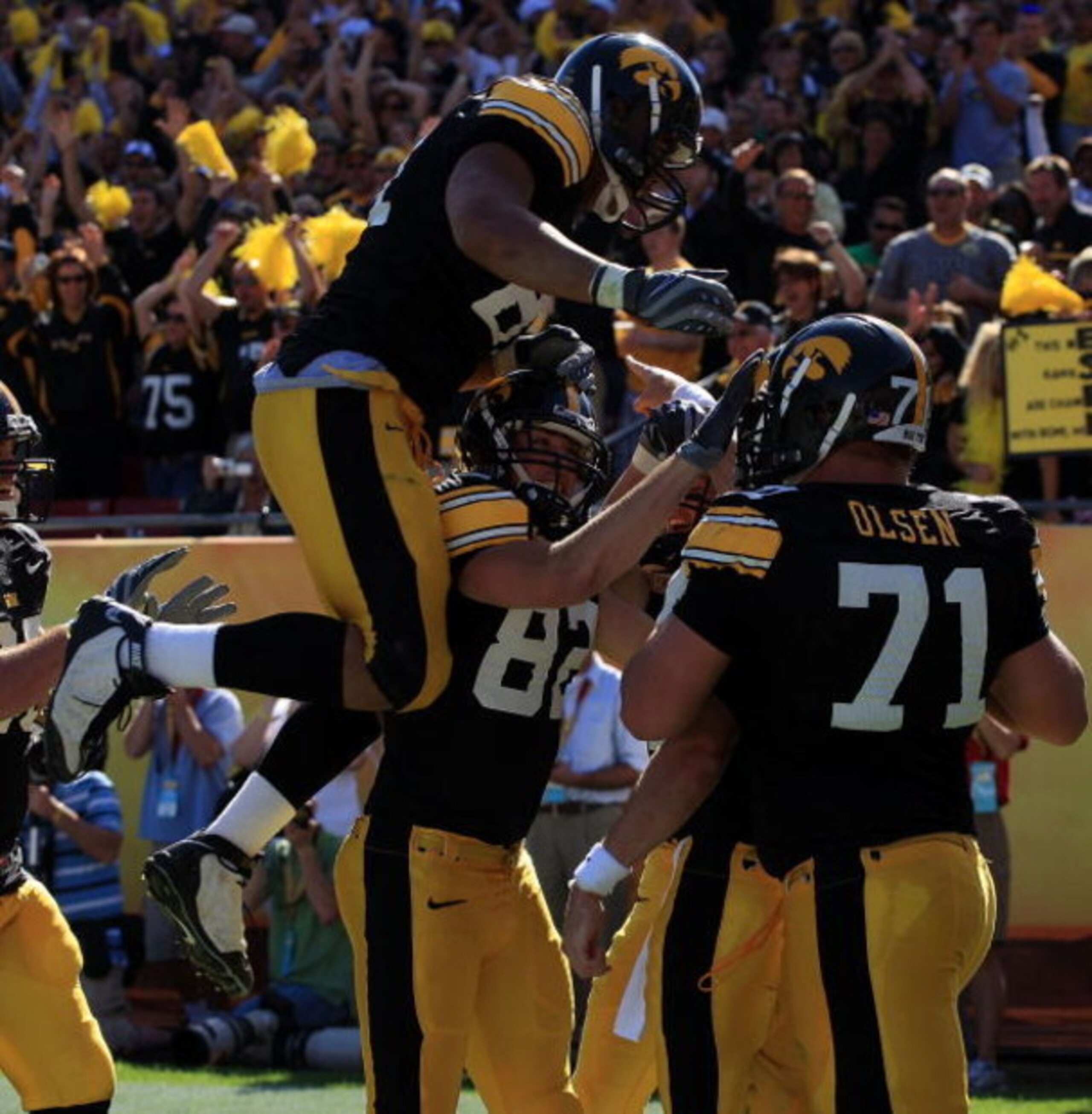 TAMPA, FL - JANUARY 01:  The Iowa Hawkeyes celebrate after a play by Ricky Stanzi against the South Carolina Gamecocks during the Outback Bowl on January 1, 2009 at Raymond James Stadium in Tampa, Florida.  (Photo by Scott Halleran/Getty Images)