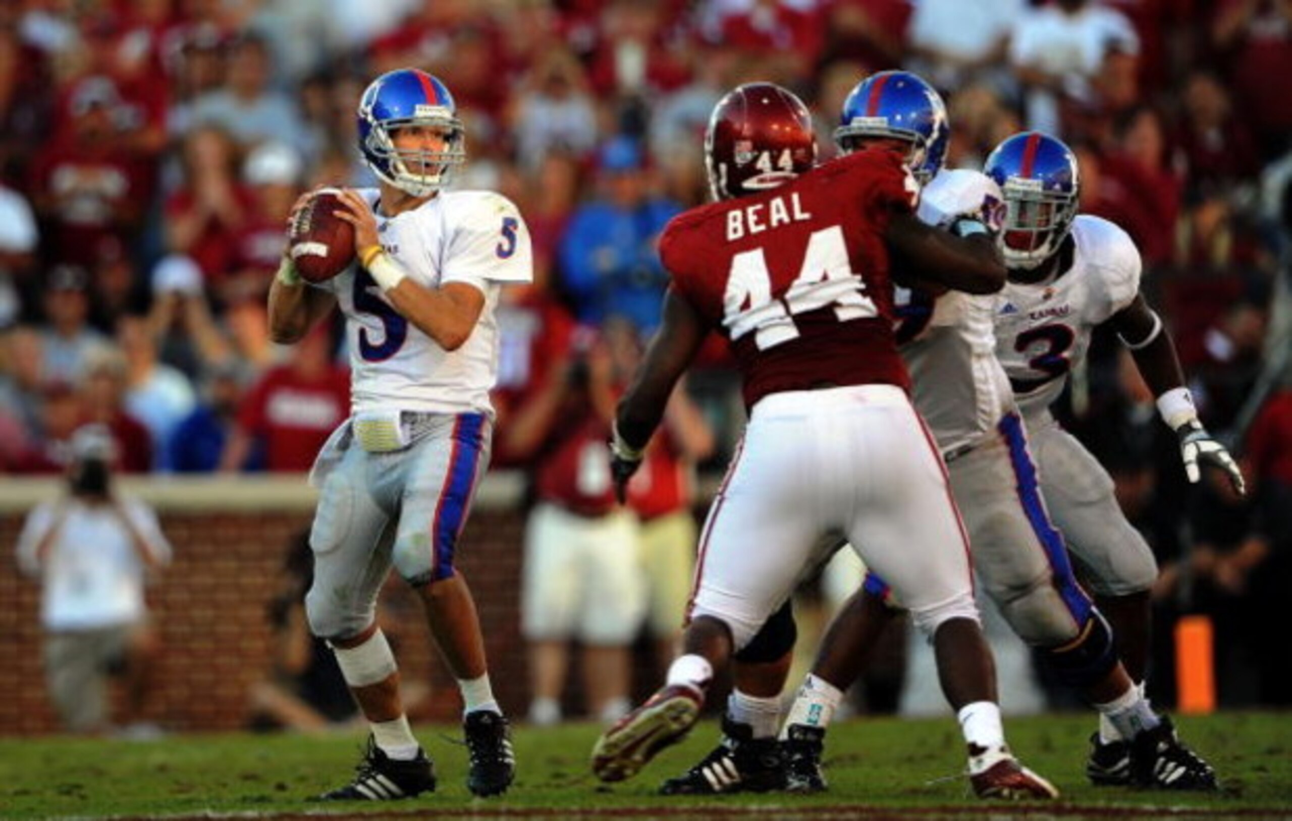 NORMAN, OK - OCTOBER 18:  Quarterback Todd Reesing #5 of the Kansas Jayhawks during play against the Oklahoma Sooners at Memorial Stadium on October 18, 2008 in Norman, Oklahoma.  (Photo by Ronald Martinez/Getty Images)