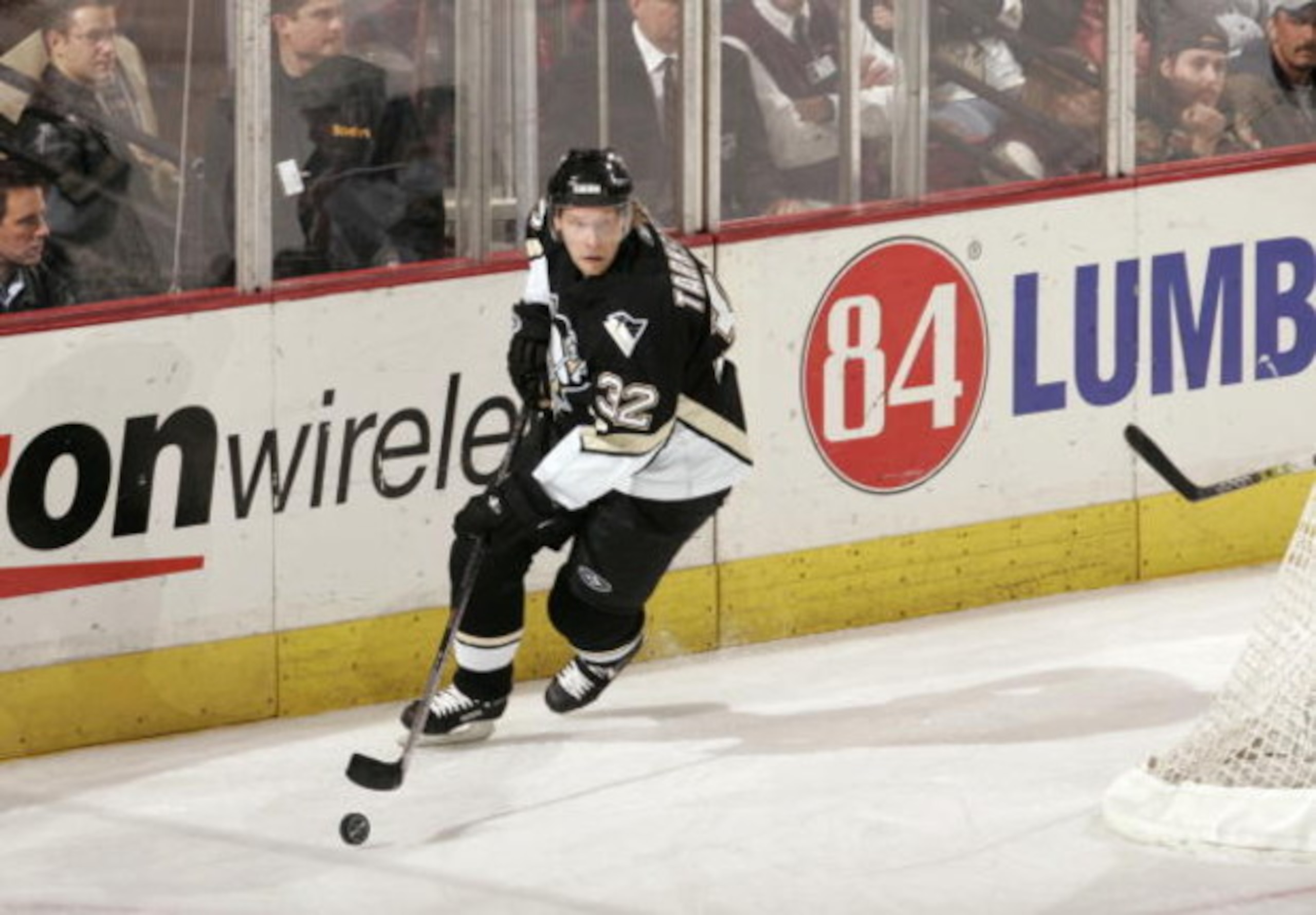 PITTSBURGH - DECEMBER 8: Dick Tarnstrom #32 of the Pittsburgh Penguins skates with the puck during the game against the Minnesota Wild at Mellon Arena on December 8, 2005 in Pittsburgh, Pennsylvania. Minnesota won 5-0. (Photo By Gregory Shamus/Getty Image