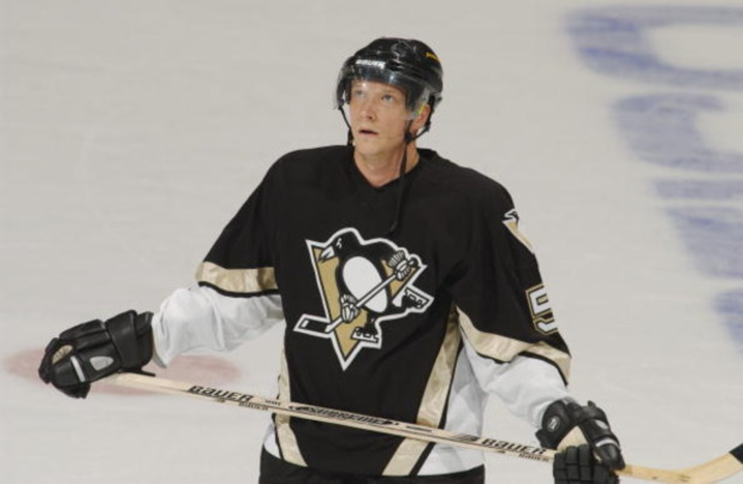 WASHINGTON - DECEMBER 11:  Defenseman Janne Laukkanen #5 of the Pittsburgh Penguins looks at the scoreboard during the NHL game against the Washington Capitals at the MCI Center in Washington D.C. on December 11, 2001.  The Penguins tied the Capitals 2-2.