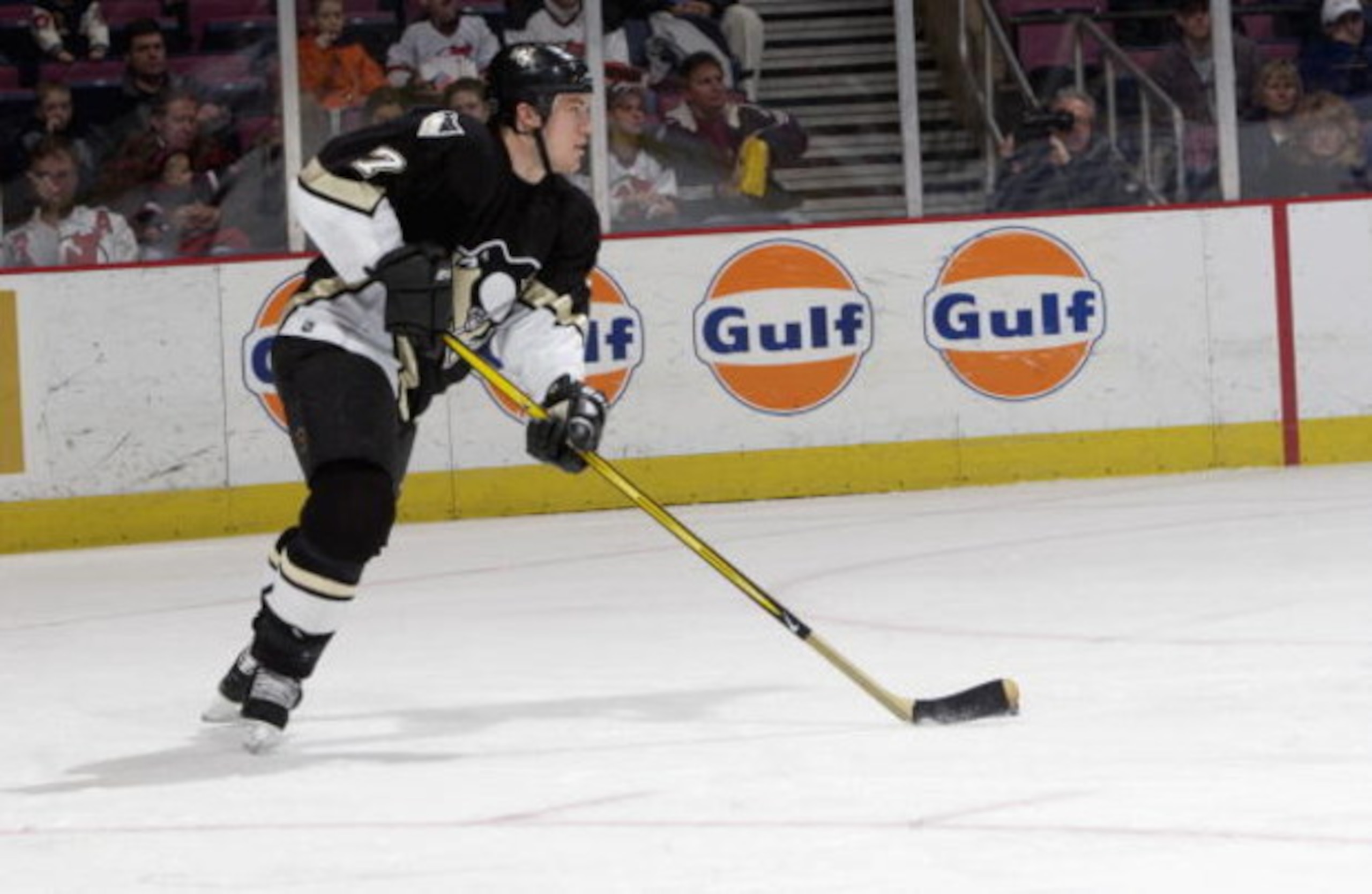 EAST RUTHERFORD, NJ - DECEMBER 6:  Defenseman Andrew Ference #7 of the Pittsburgh Penguins skates with the puck against the New Jersey Devils at Continental Airlines Arena on December 6, 2002 in East Rutherford, New Jersey. The Devils won 2-1. (Photo by E